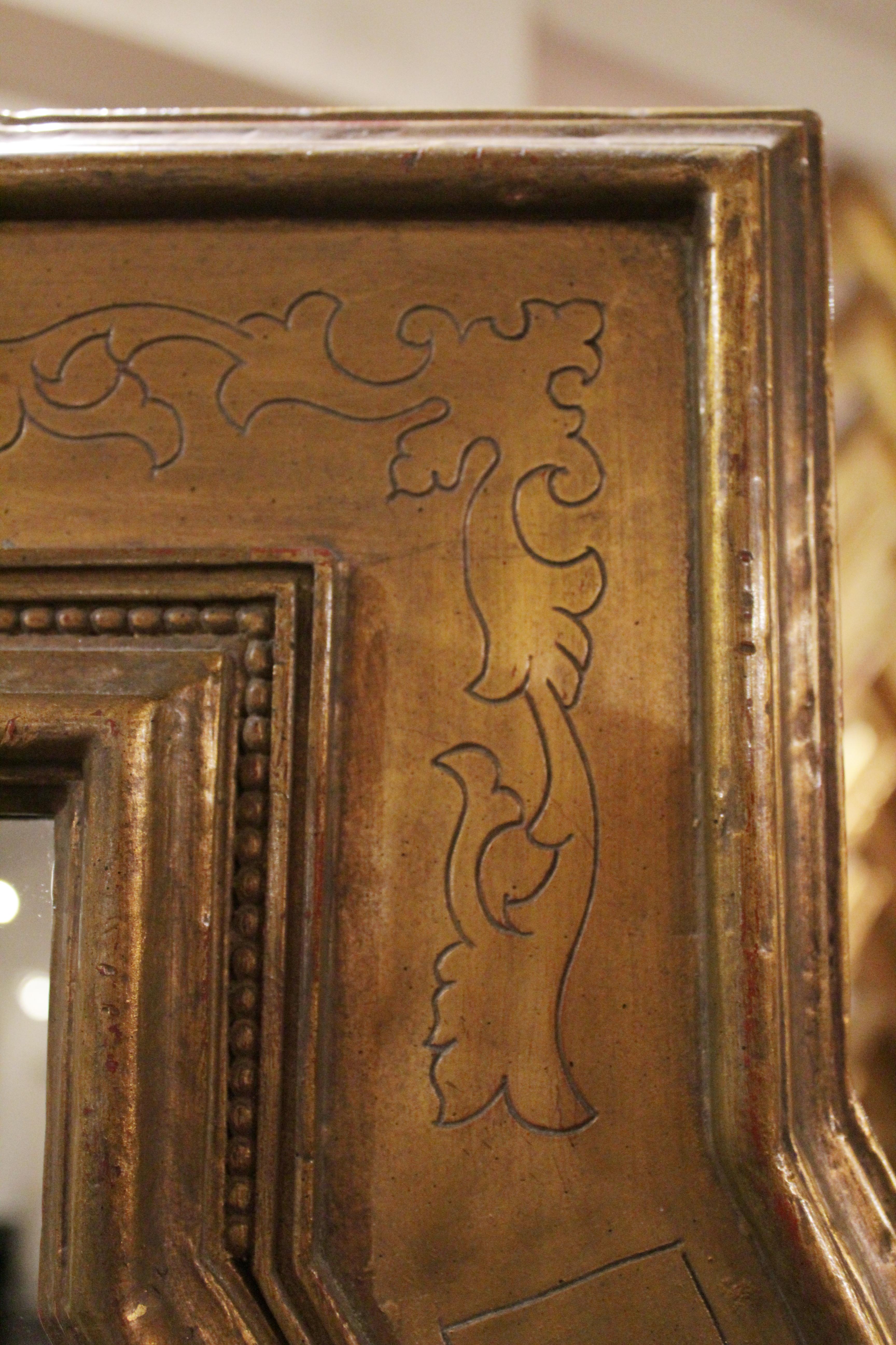 Hand carved frame in the style of baroque revival.