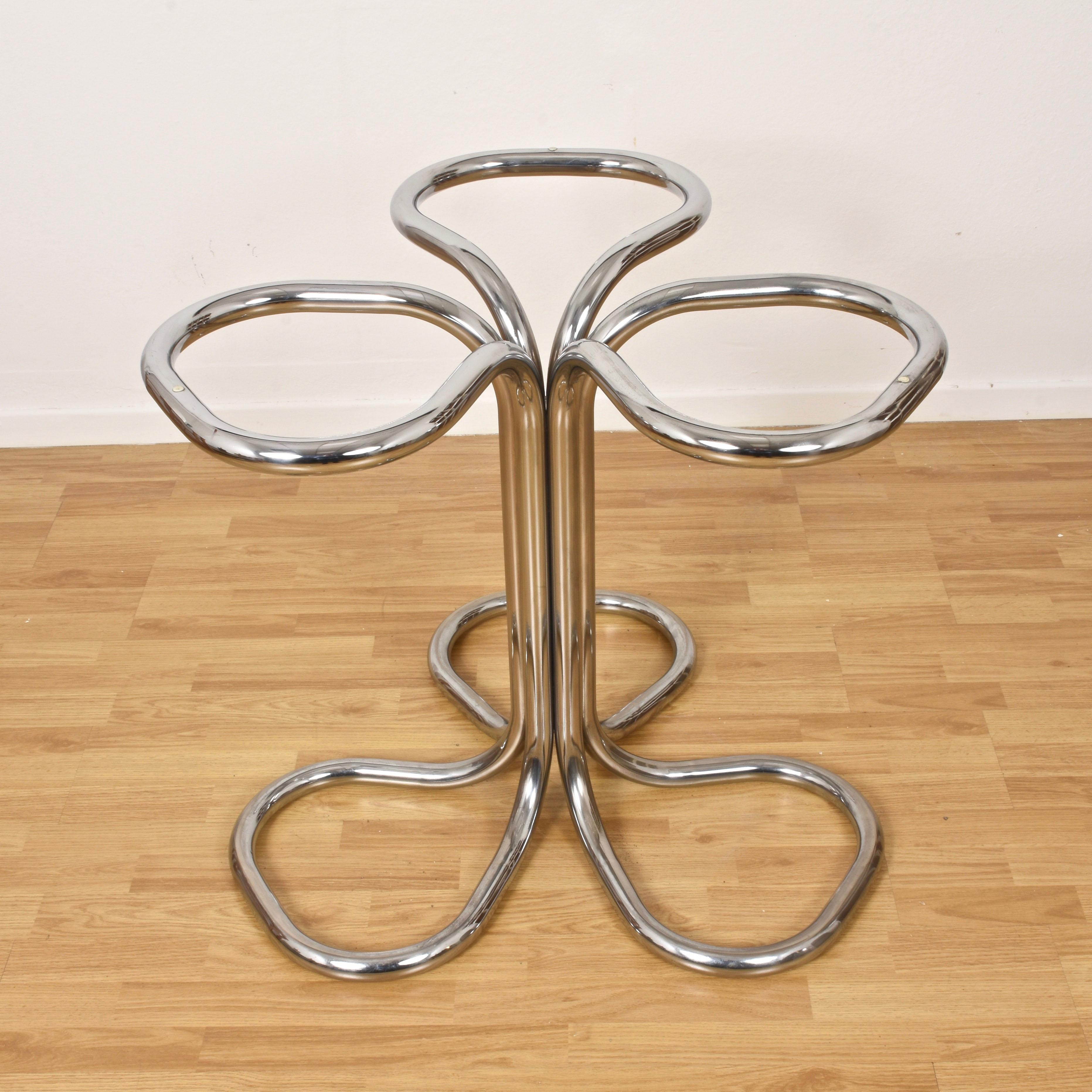 Italian dining table, Giotto Stoppino style. Chromed metal base, smoked glass top. Diameter 120 cm.