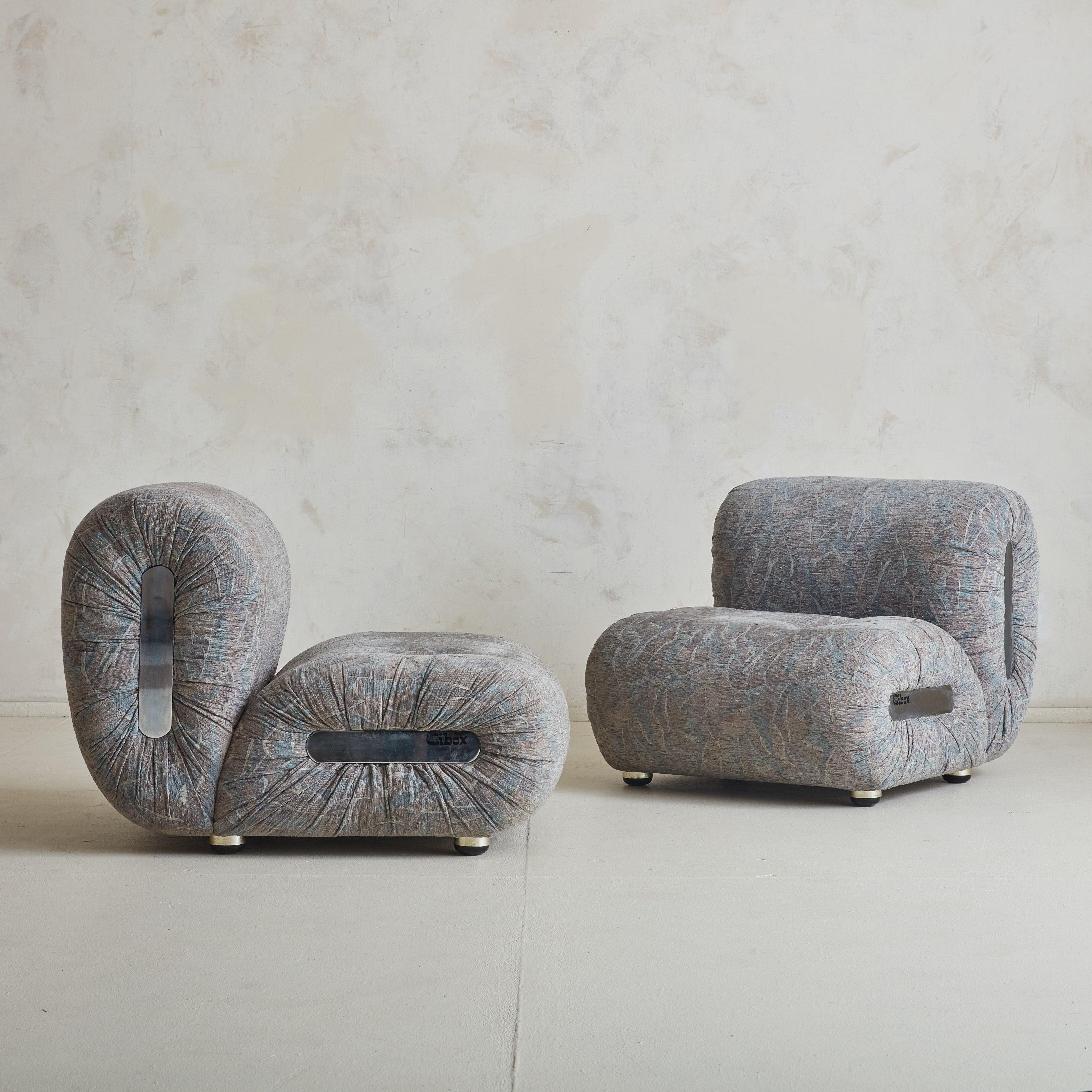 This modular lounge chair by Cibox has a sculptural, armless profile that rests on spherical chrome feet. Designed for comfort, the back flexes gently, inviting relaxation. Crafted in the 1970s, the generously proportioned silhouette, with chrome
