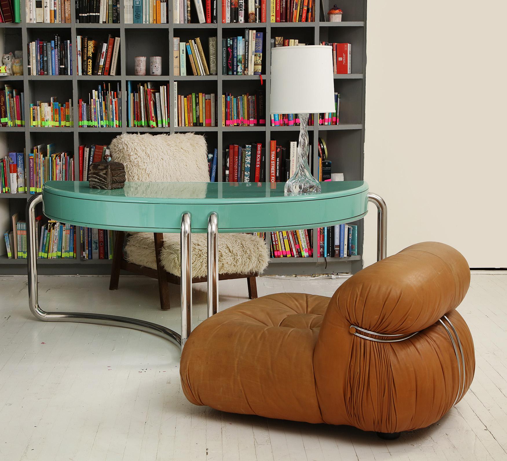 Italian chrome lacquer green desk 1970s, midcentury

Unusual large green lacquer desk. Incredible lines.
Although the maker is unknown it is clearly a designer piece from 1970s.
It has three drawers in the front for storage.
  