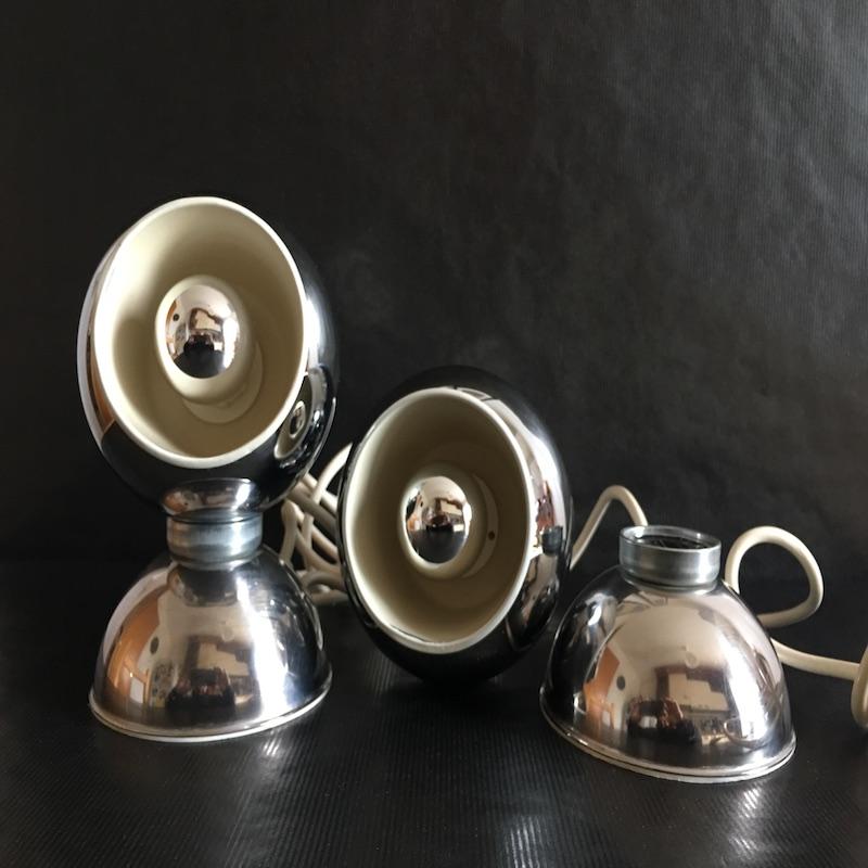 Coppia di Eyeball Lamps in acciaio cromato disegnate da Goffredo Reggiani e prodotte da Reggiani nei primi anni '70, in piena 