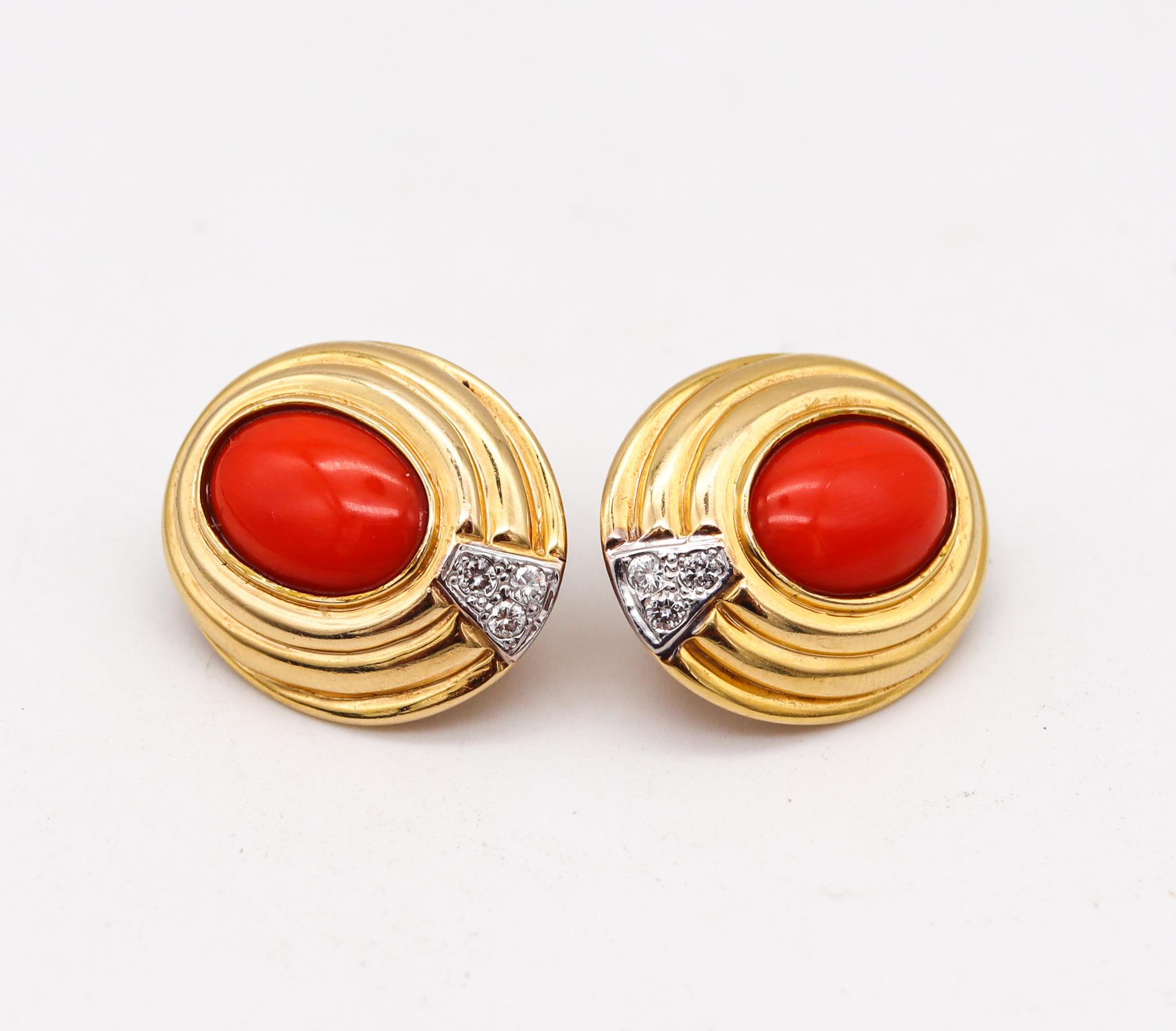 Italian modernism earrings with Coral.

Beautiful classic pair, created in Napoles Italy, back in the 1970's. These earrings has been crafted with classic revival patterns in solid yellow gold of 18 karats with high polished finish. Fitted with