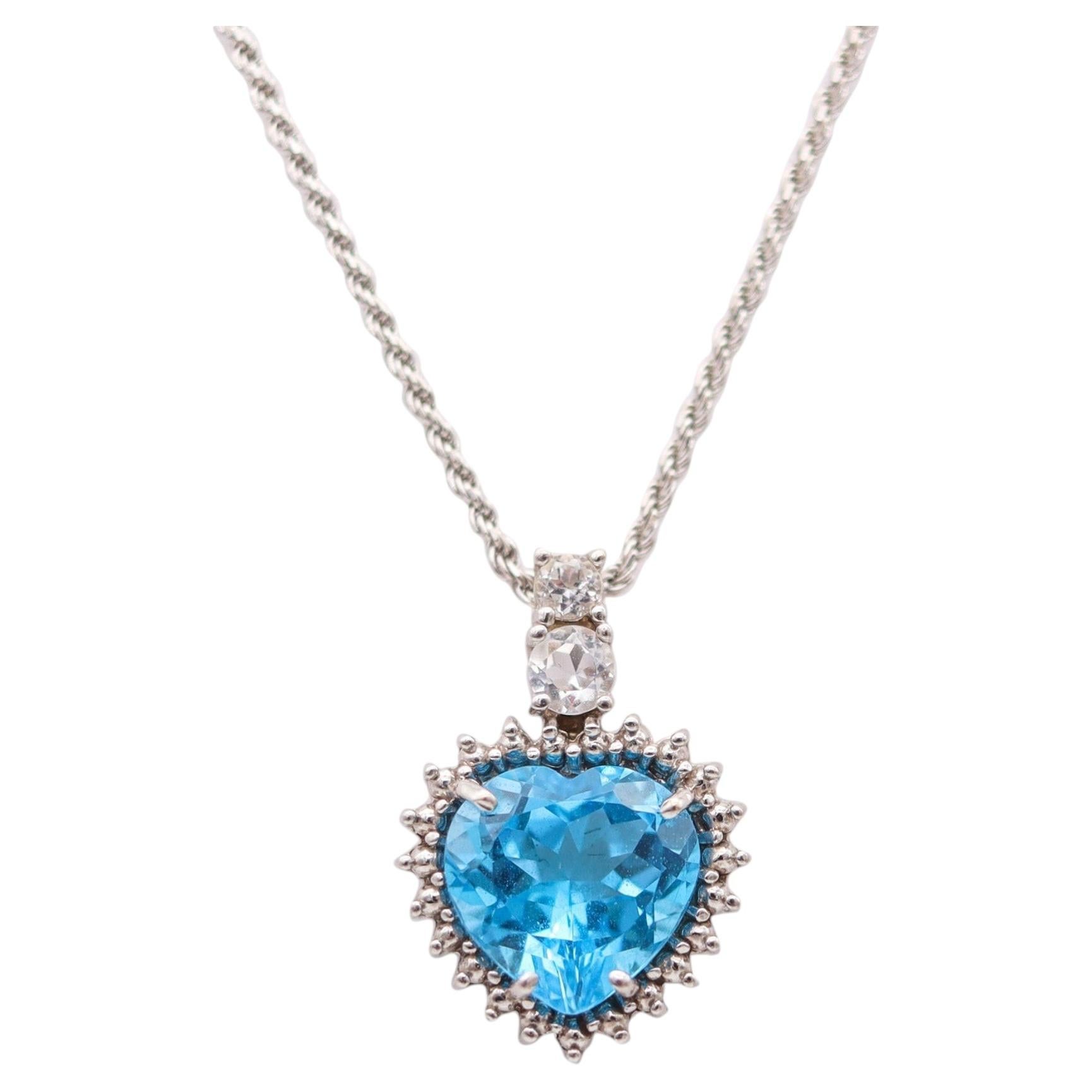 Collana classica italiana con ciondolo a forma di cuore in oro 14Kt con topazio blu