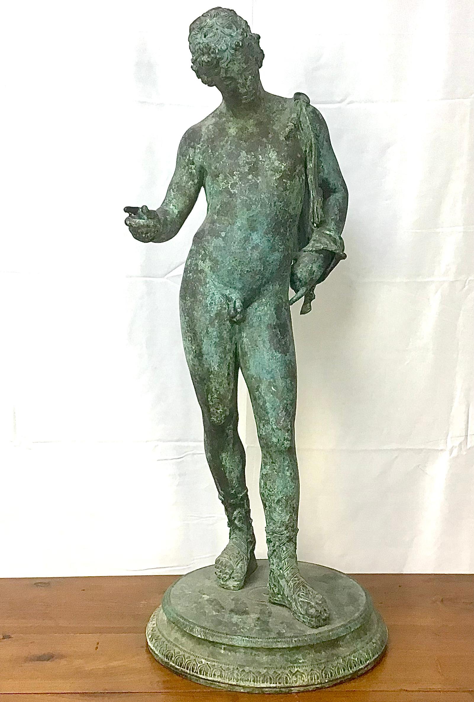 Italian Classical Grand Tour bronze sculpture of Narcissus with a verdigris patina, believed to by Chiurazzi, or a similar foundry, Naples, circa 1900.

Narcissus is shown nude except for a pair of sandals, standing on a circular plinth with his