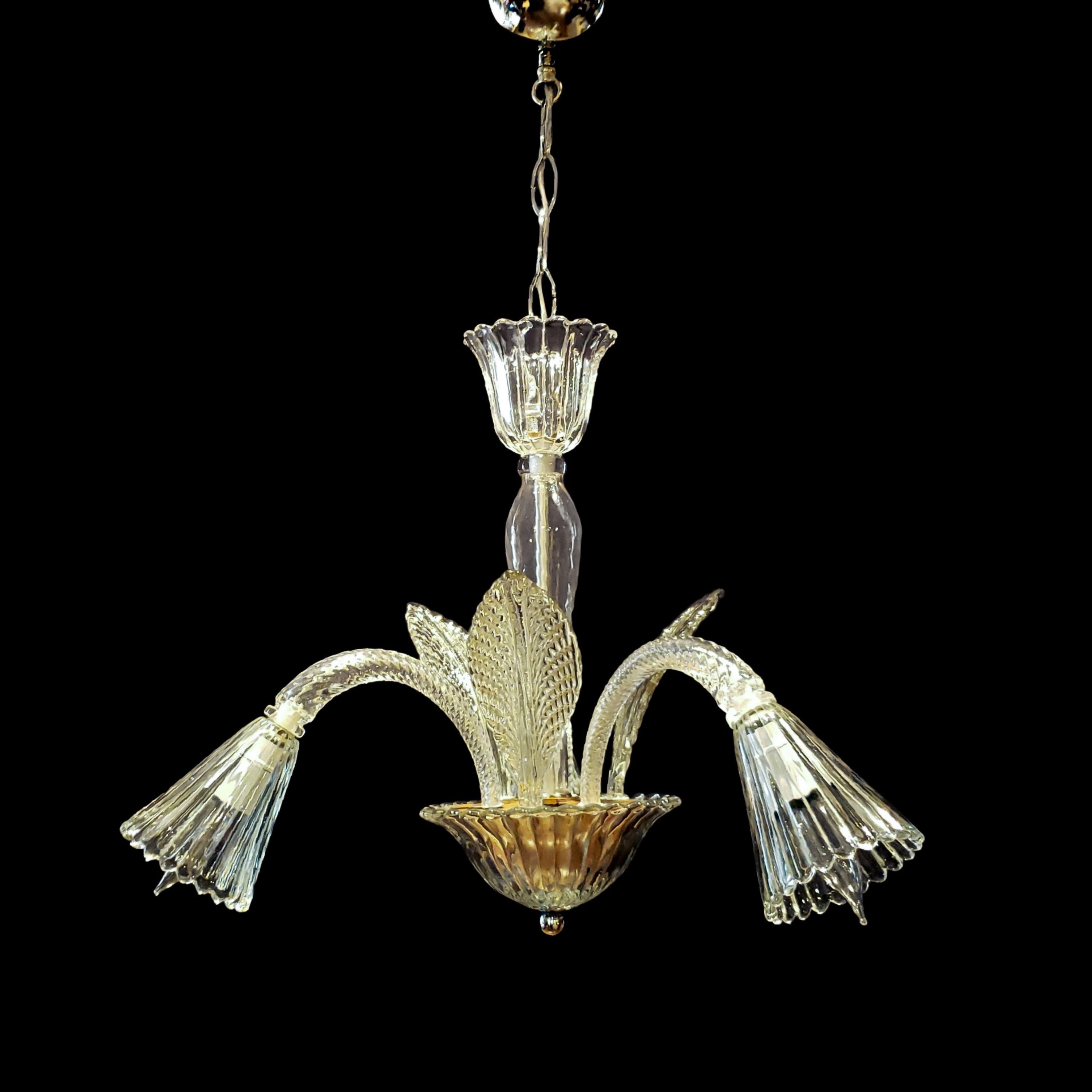 Italian 20th Century chandelier has a clear crystal construction with three arms and three upward leaves. This comes rewired and ready to install. Ships disassembled. Cleaned and restored. Please note, this item is located in our Scranton, PA