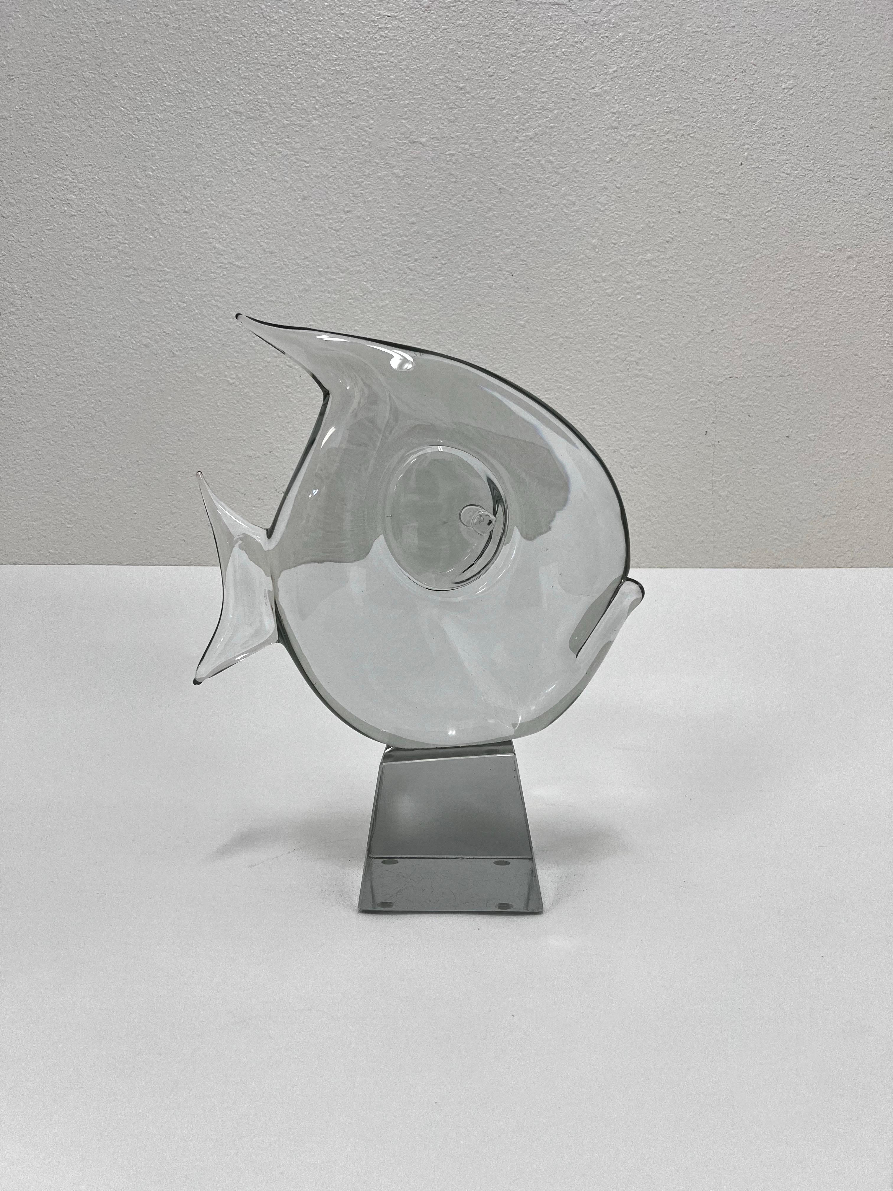 1970’s Italian clear murano glass fish sculpture by Seguso. 
In good original vintage condition no chips, 
Some scratches on the underside of base. 
They might be able to be polished out. 

Measurements. 12” Wide, 4.5” Deep, 15” High. 