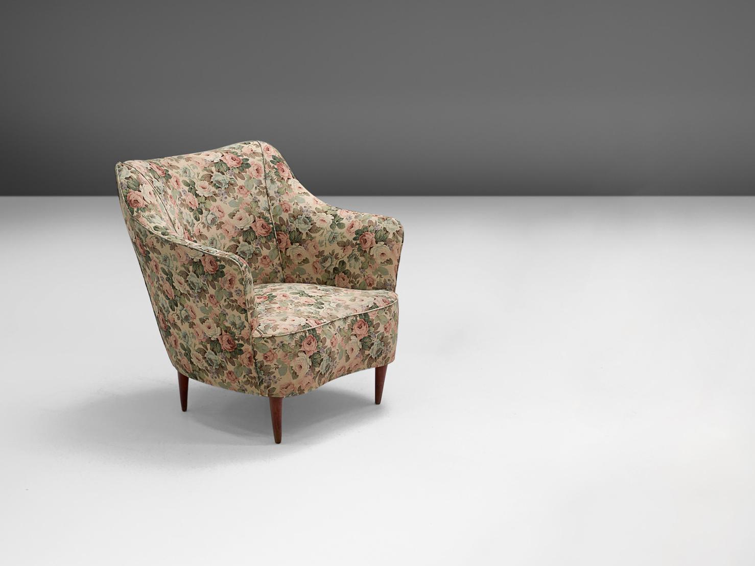 In the style of Gio Ponti, lounge chair, wood and floral fabric, Italy, 1940s.

Elegant and romantic club chair designed in the style of Gio Ponti with original upholstery of fauna and flora. The design is based on a splendid construction of
