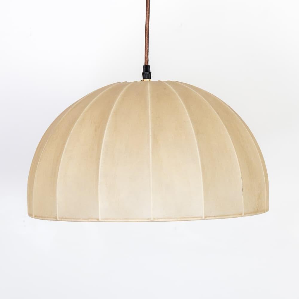 Incredible cocoon pendant light in the style of Achille & Pier Giacomo Castiglioni from Italy, 1960's. Unique dome shade in a creamy parchment resin. Original dome resin shows nice age and patina. New antique brass canopy and newly rewired with