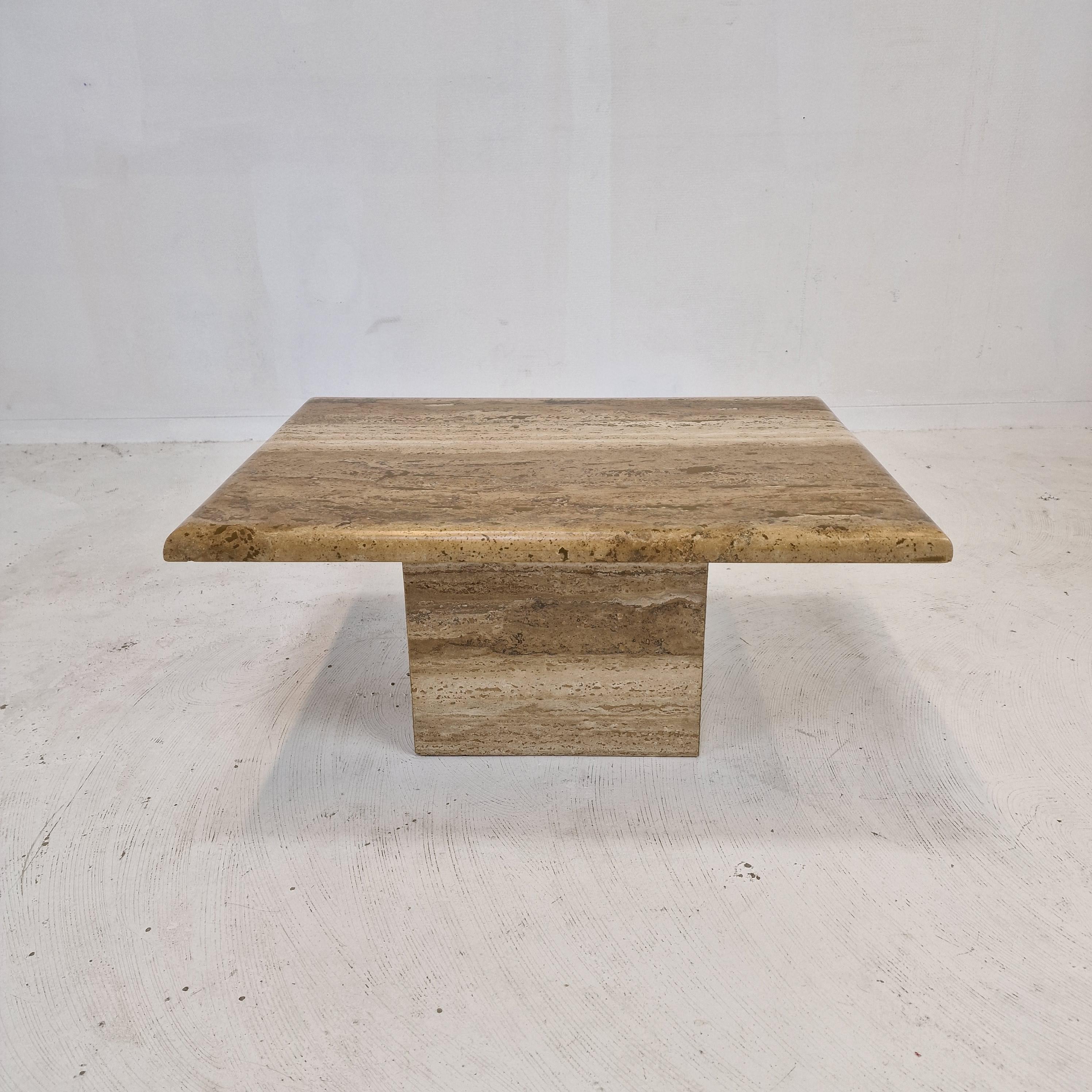 Very nice Italian coffee table handcrafted out of travertine, 1980's.

The top is rounded on the edge. 
It is made of beautiful travertine.
Please take notice of the very nice patterns.

It has the normal traces of use, see the pictures.

We