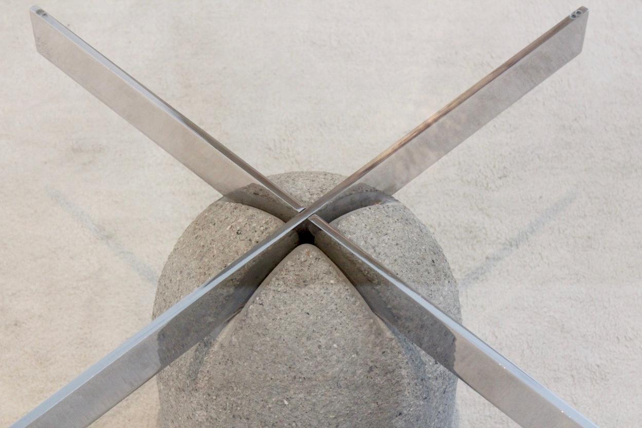 Concrete coffee table designed by Giovanni Offredi for Saporiti Italia in the 1970s. The dome shaped concrete base has a chrome cross plinth to support the glass top. The table is very strong and still has a very light exposure. This coffee table is