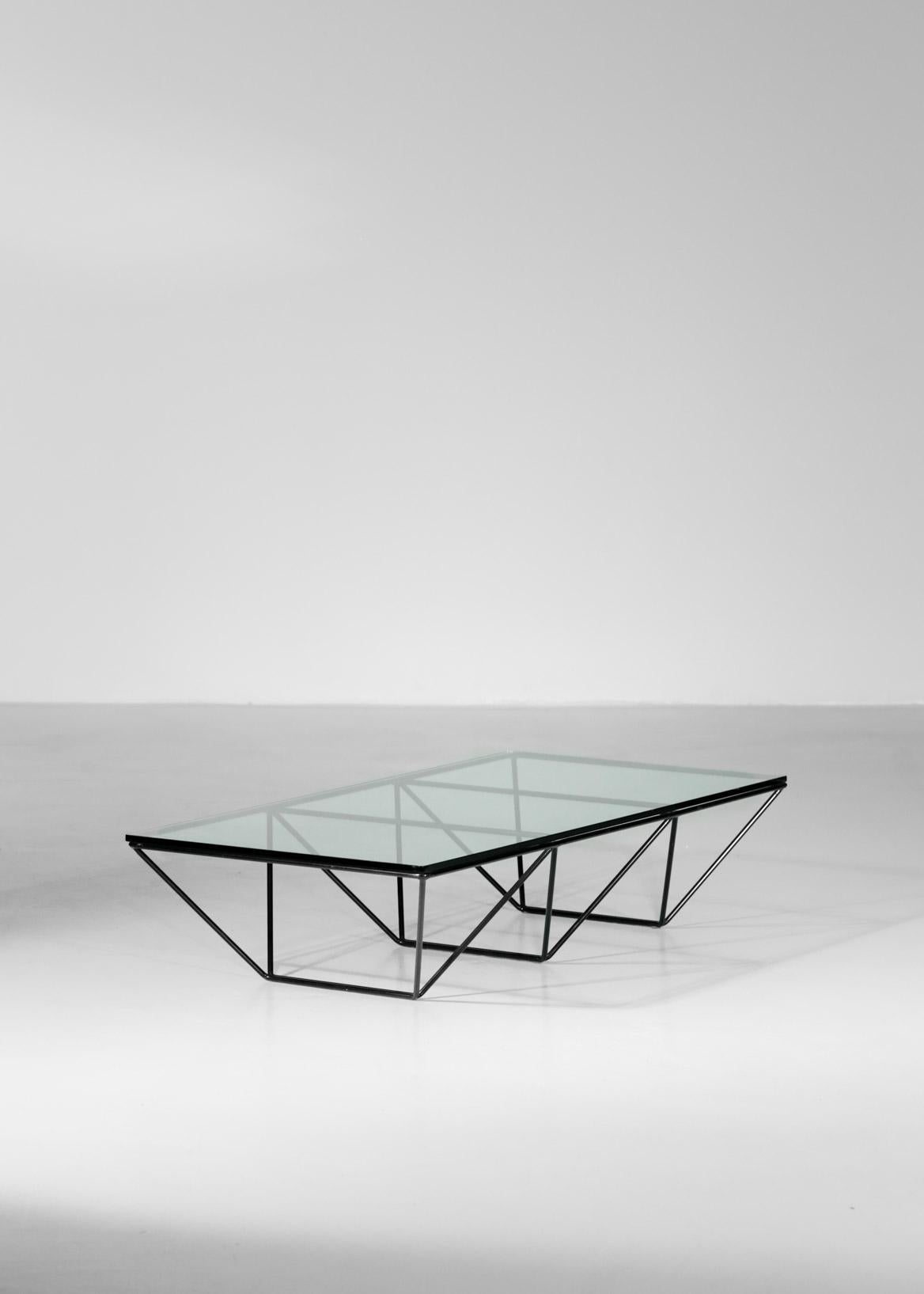 Coffee table designed by Paolo Piva.
Geometrical frame with a glass on top.