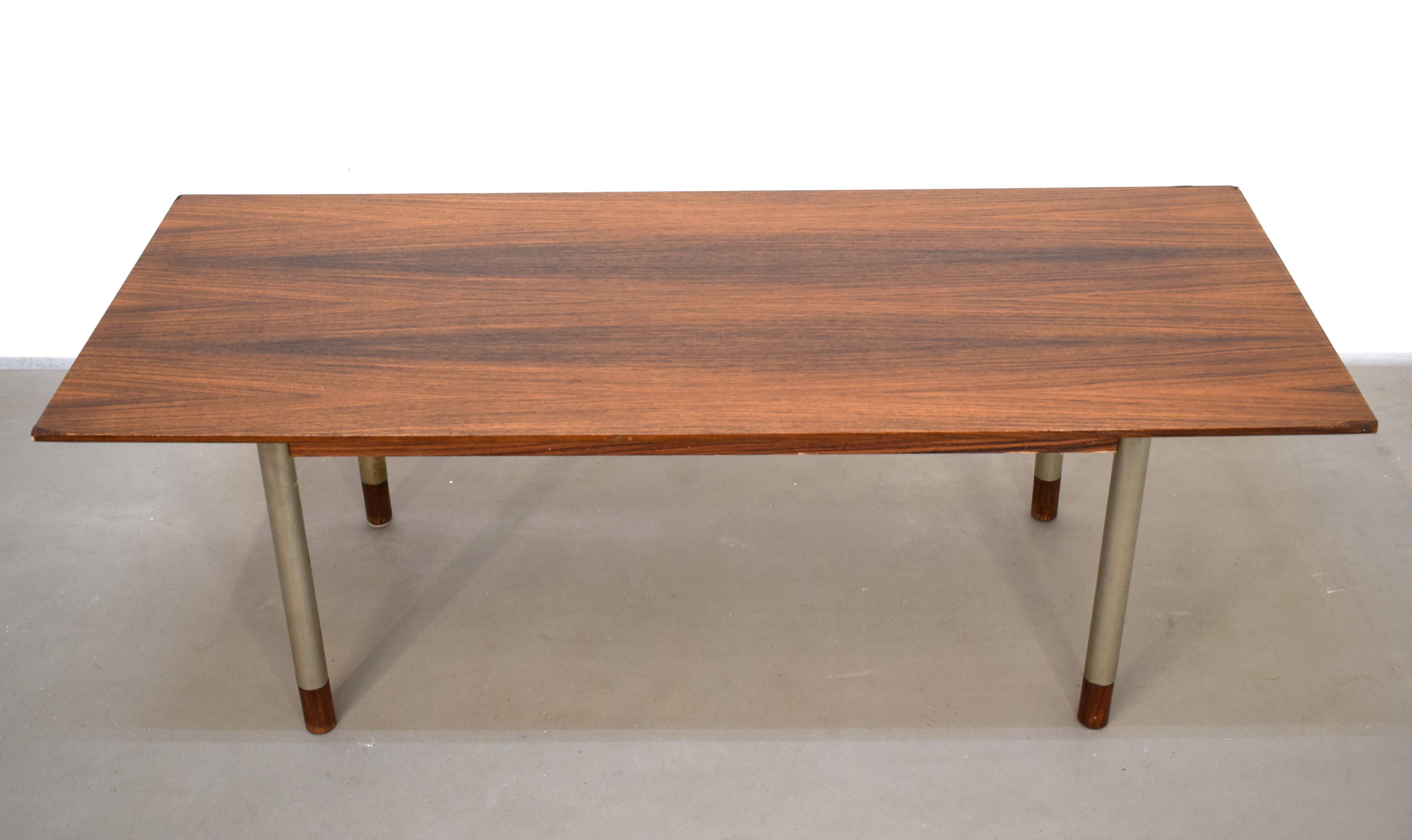 Italian coffee table by Sibast, 1960s.
 Rosewood top
Chromed steel feet
Dimensions: H= 41 cm; W= 120 cm; D= 50 cm.