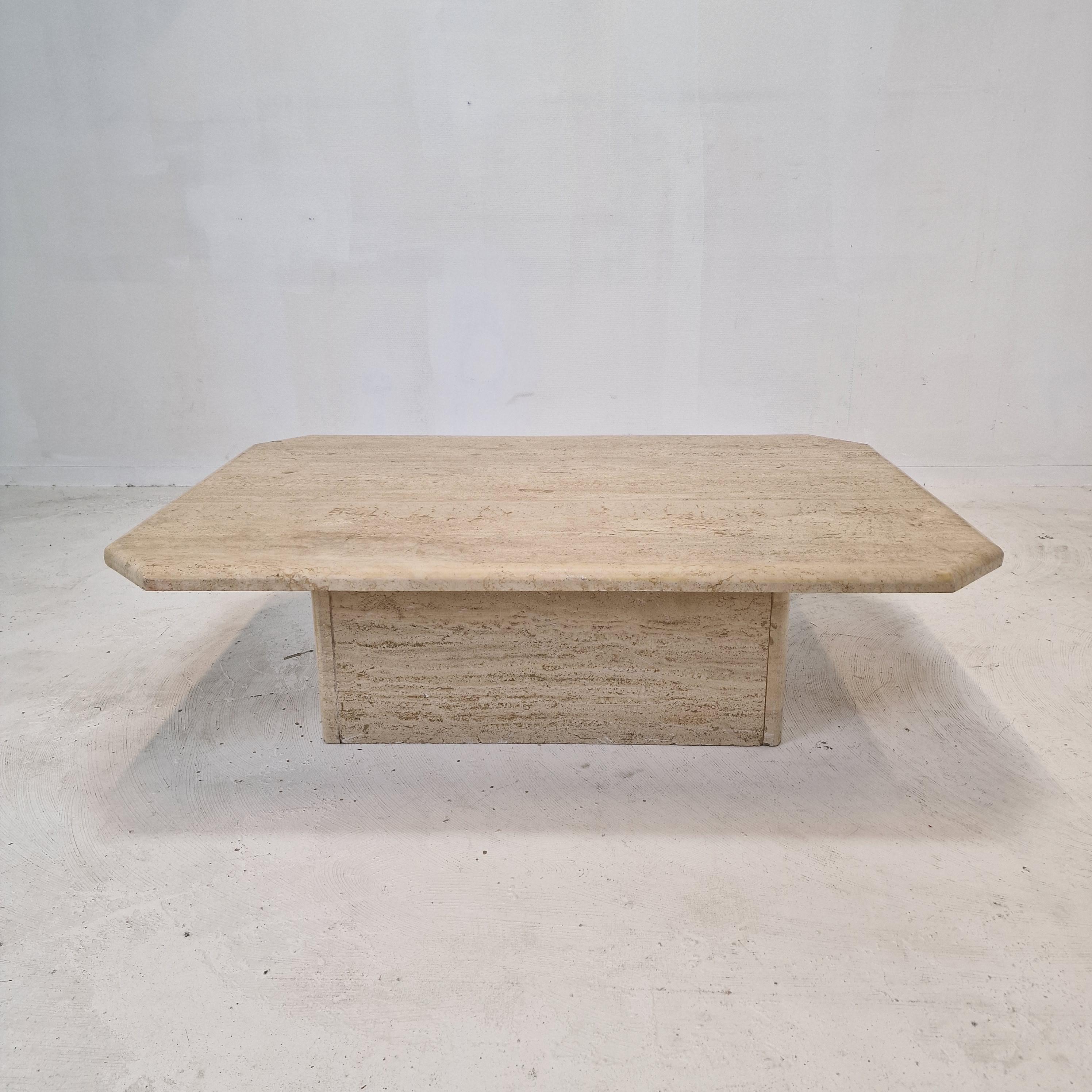 Very nice Italian coffee or side table handcrafted out of travertine, 1980s. 

The top is rounded on the edge and also the base is rounded on the corners.
It is made of beautiful travertine. 
Please take notice of the very nice patterns. 

It