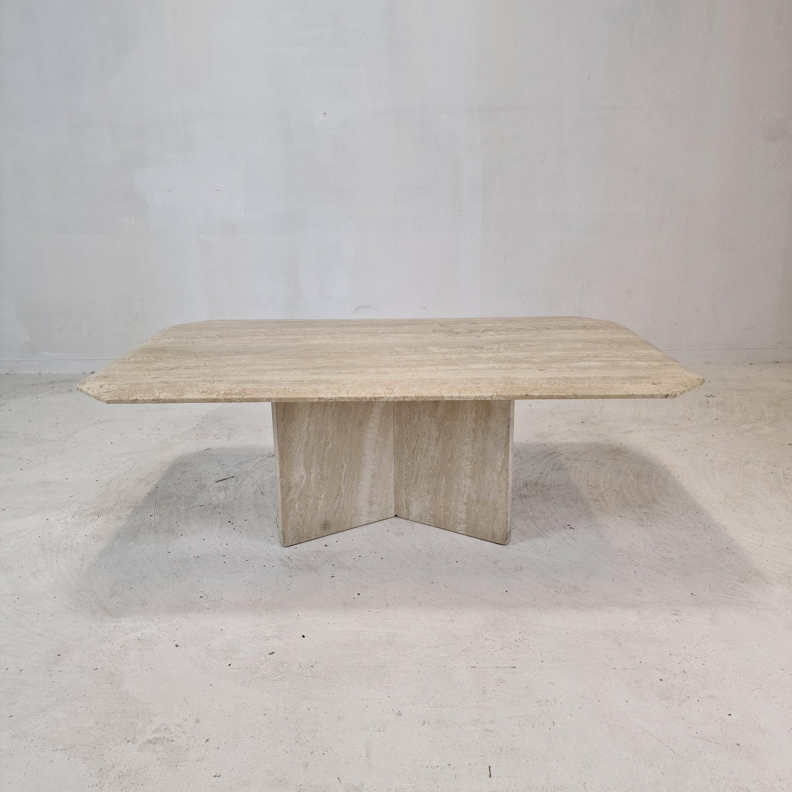 Very nice Italian coffee or side table handcrafted out of travertine, 1980s.
It has a very nice 3-leg base.
It is made of beautiful travertine.
Please take notice of the very nice patterns.
It has the normal traces of use, see the pictures.
 