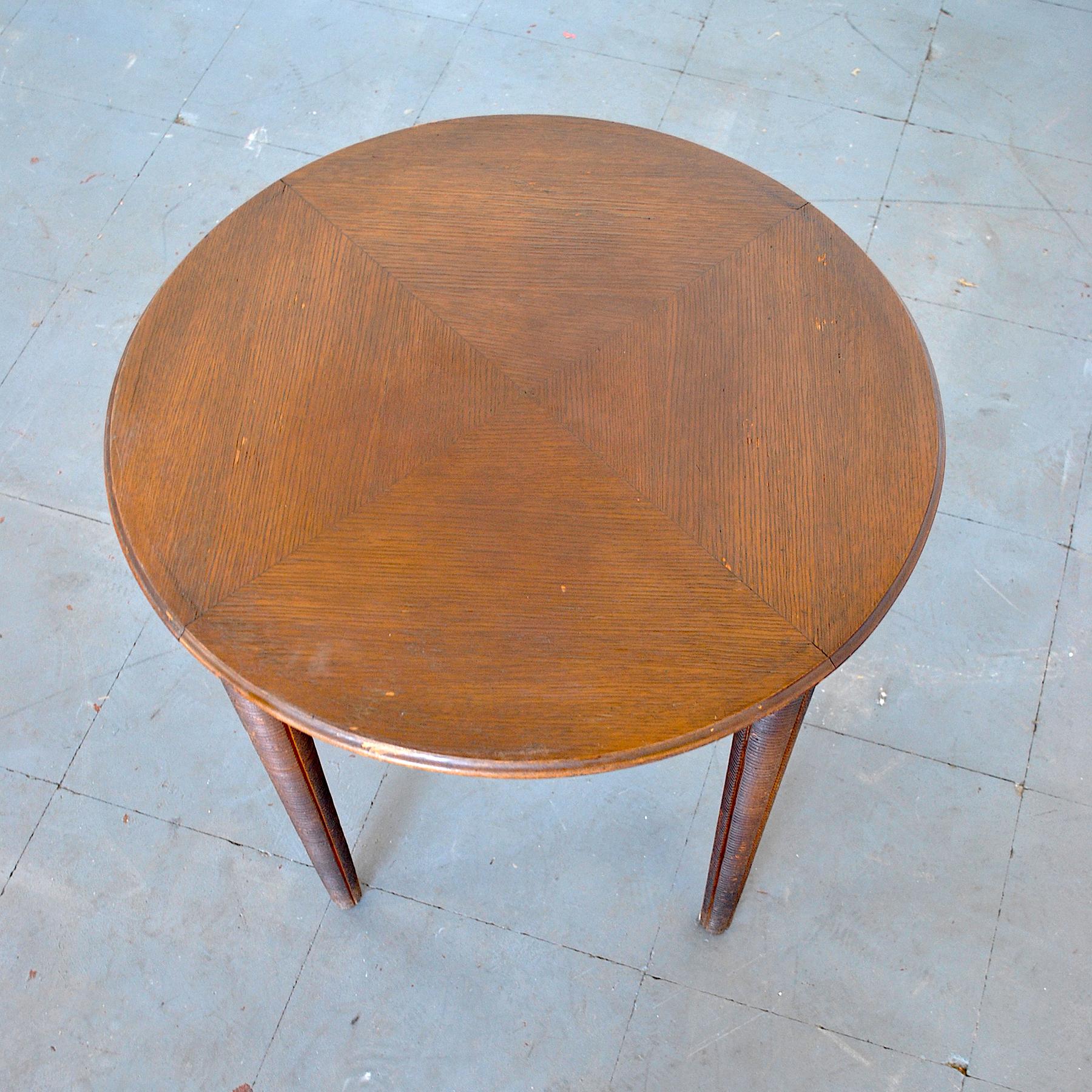 Circular coffee table form Milan school in Gio Ponti style with feet worked in an excellent way.