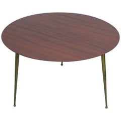 Mesa de centro italiana redonda en caoba y latón, años 50