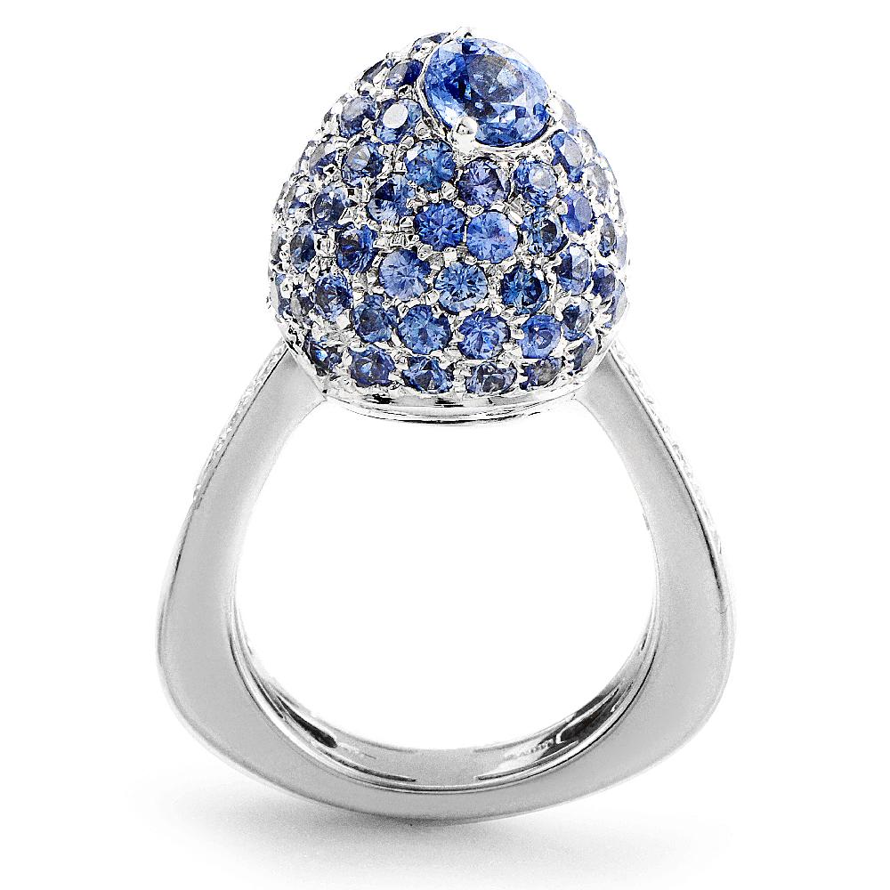 Featuring the tasteful, prestigious combination of attractive blue sapphires and elegant white gold, this ring offers stylish classy look. The 18K white gold body boasts 0.30ct of sparkly diamonds set beneath the main decoration that are the
