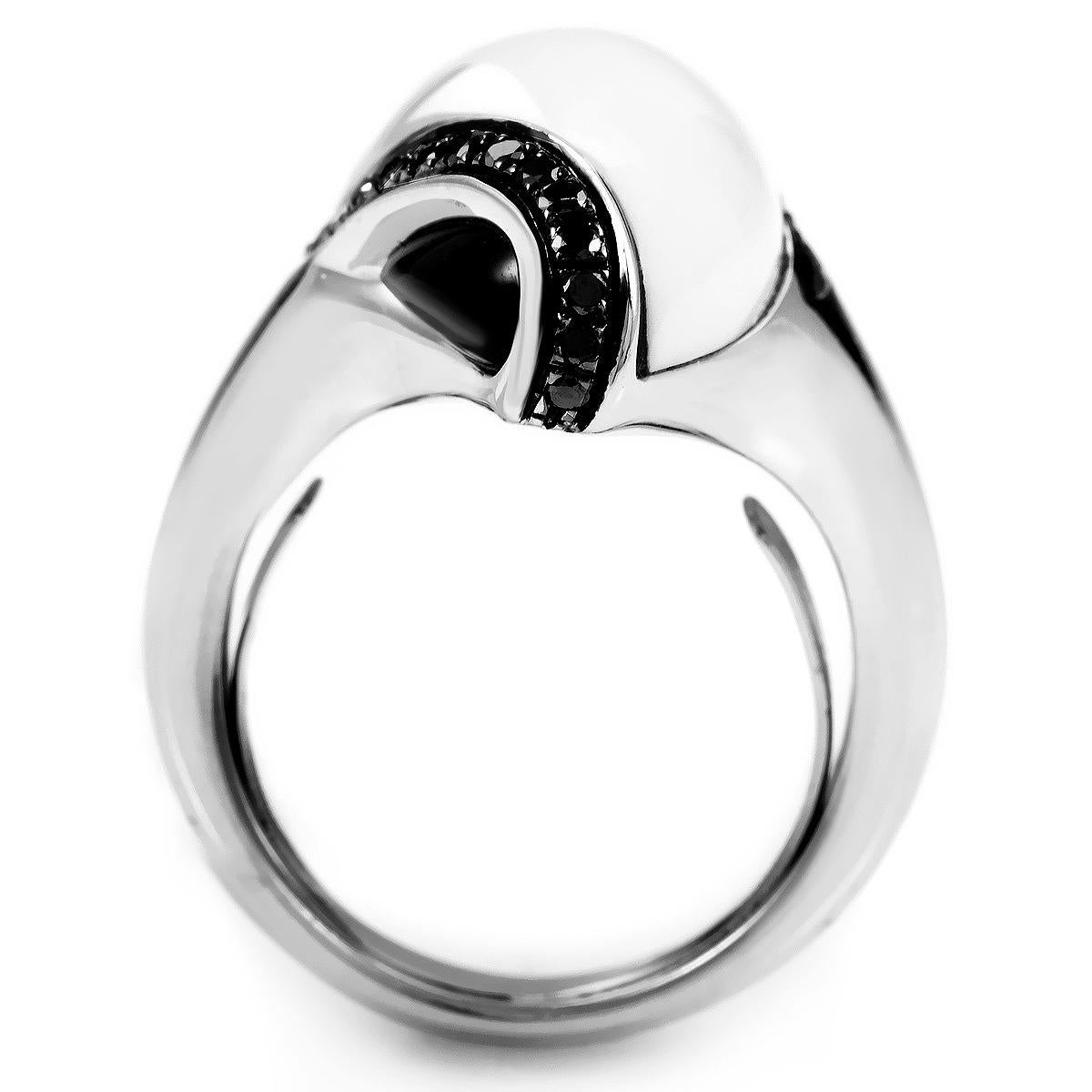 A brilliant, futuristic design that is bound to astonish and dazzle every single time, with the impressive, curvy 18K white gold body twisting its way up to the stunning white agate stone contrasted beautifully by the delicate black diamonds