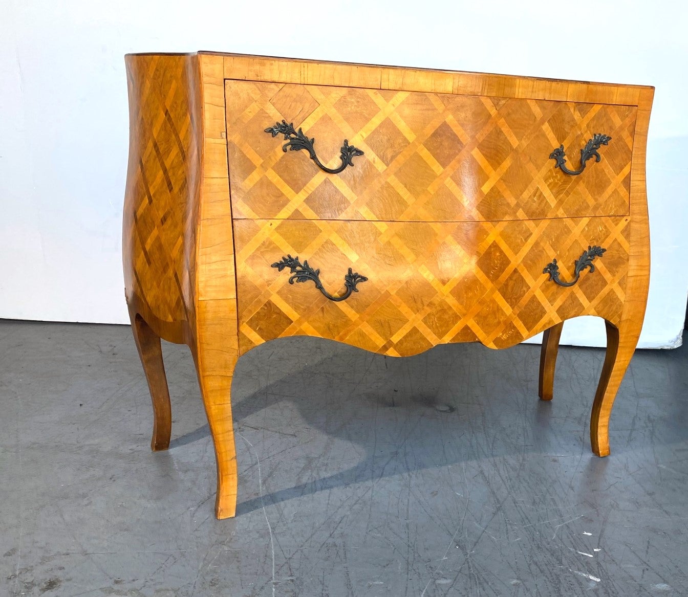 An Italian Parquetry Commode / Chest of 2 large drawers. Nice proportions, Acanthus leaf decorated hardware. Cabriole legs.  Stamped verso 