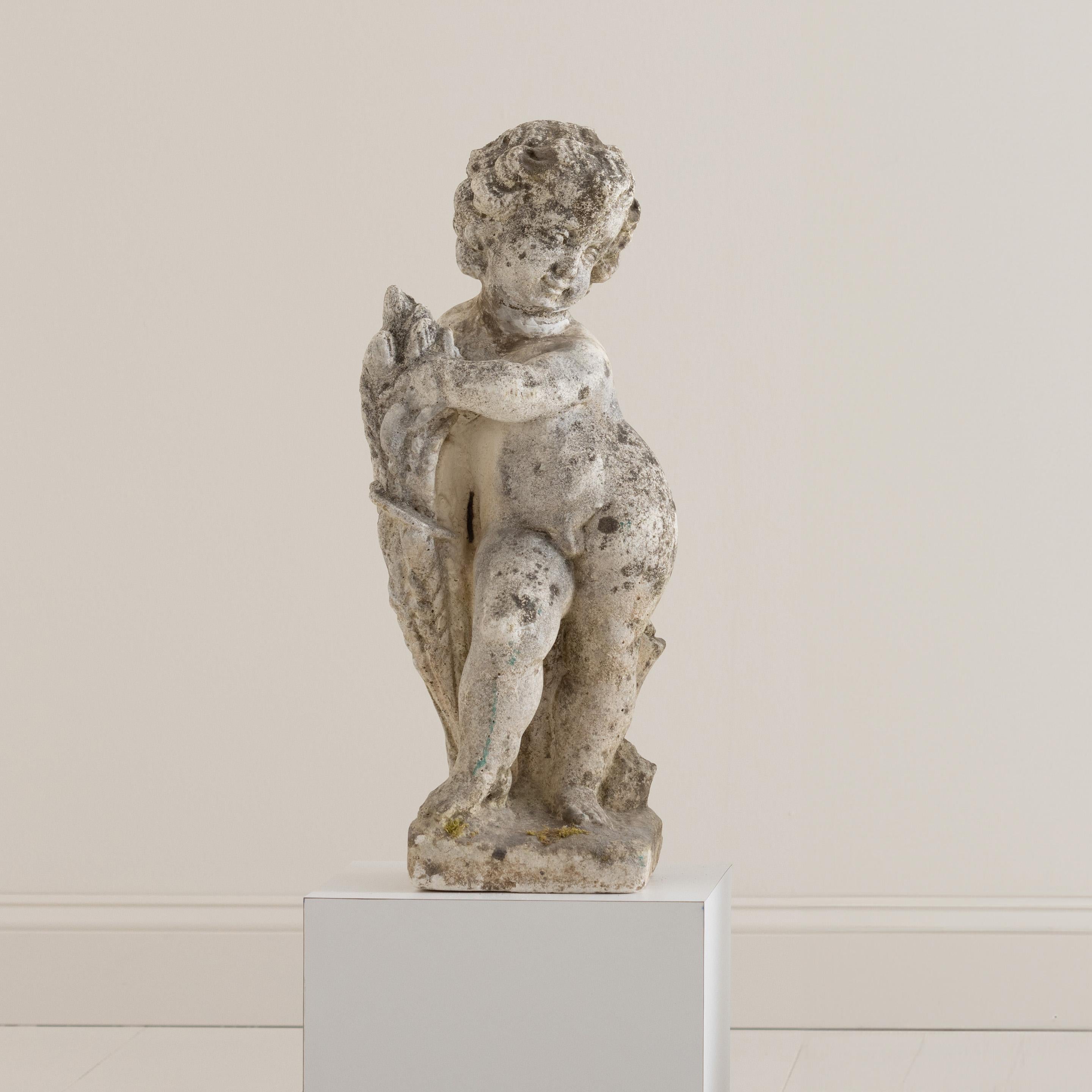 Early 20th century concrete Italian garden statue of cherub / putti figure, c. 1920. This charming, angelic statue is suitable for outdoor use. 


We offer expedited, fully-insured, custom packaged / crated, global shipping, including delivery to