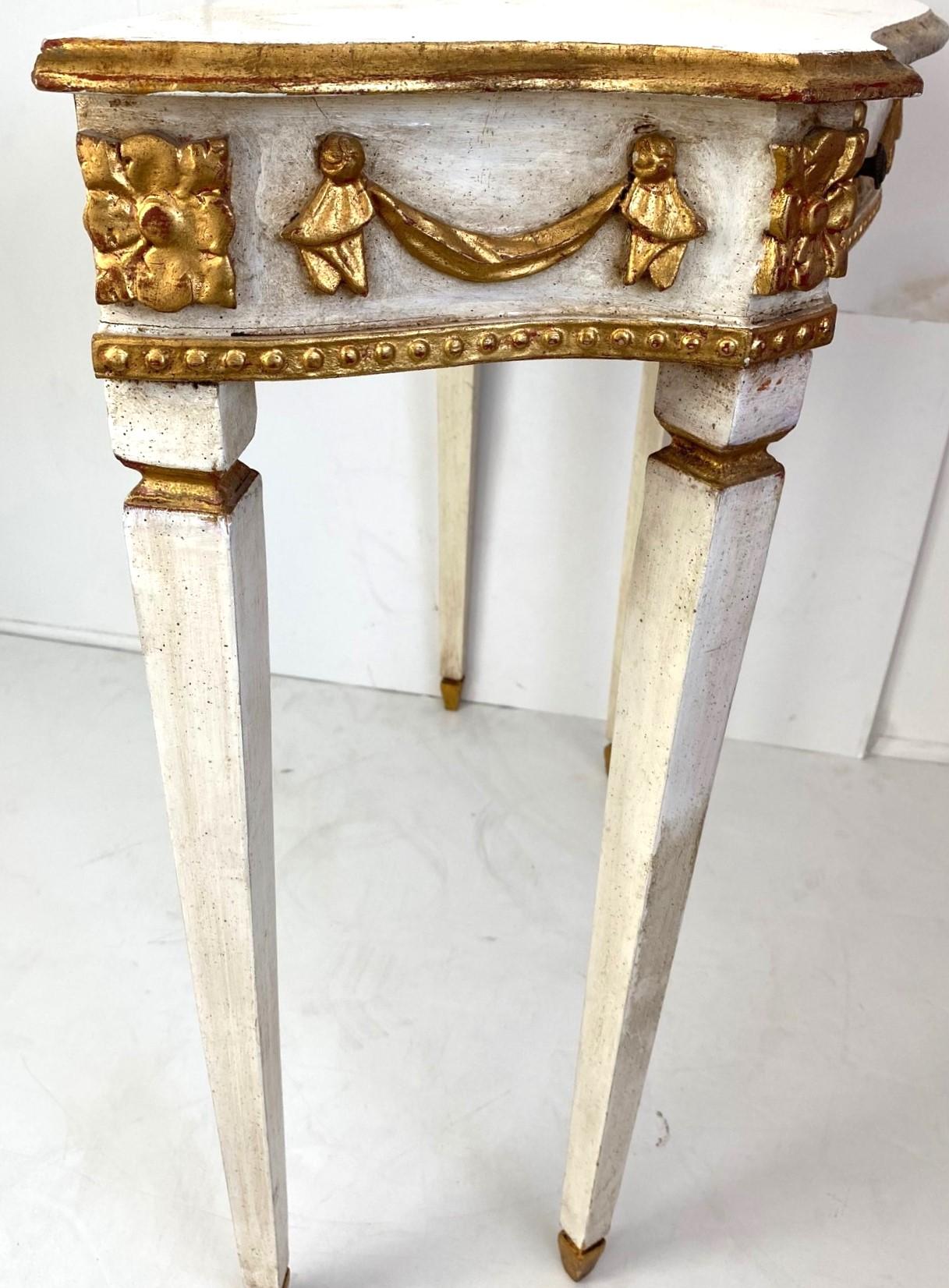An Italian gilded console with a single drawer, circa 1950s.
