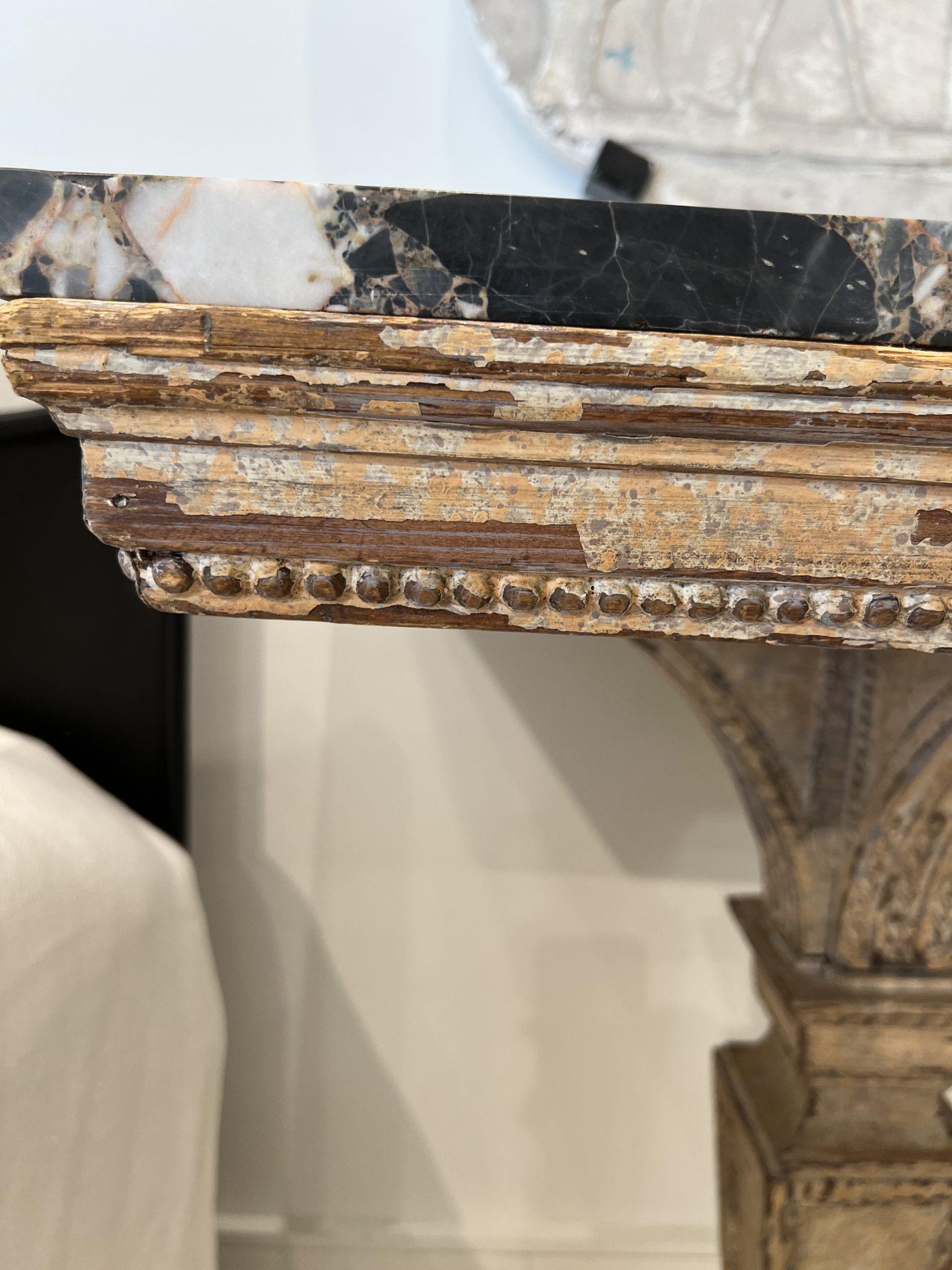 This striking console will enhance your life on a daily basis. The unusual height makes it perfect for an entry hall “landing zone” The beautiful marble top is impervious to keys, coins and spills. The strong and sturdy legs give it a regal bearing.