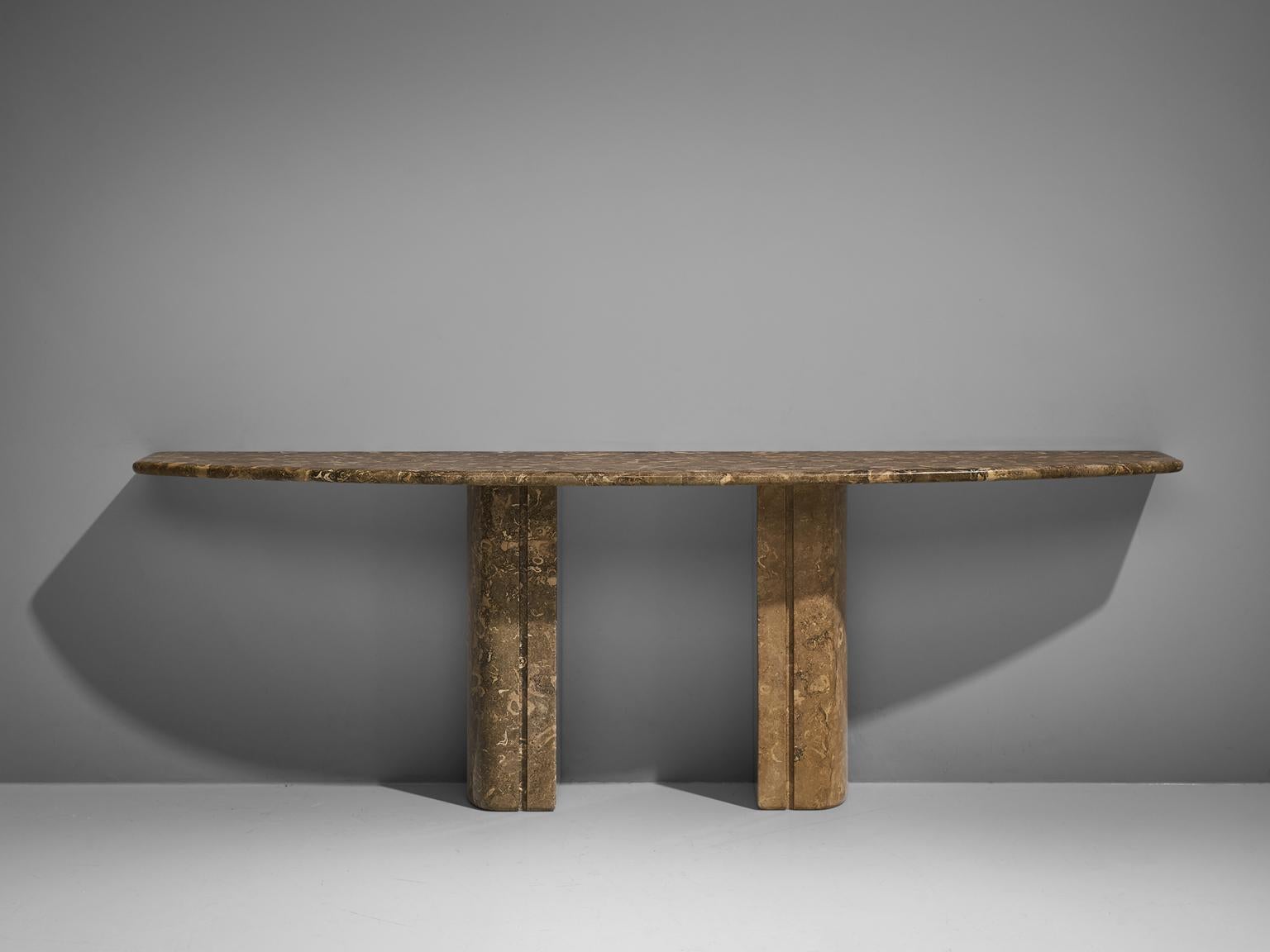 Console table, marble and metal, Italy, 1970s.

This console is a beautiful example of Italian design with an almost monumental appeal. The base of the table is formed out of two thick pillars. The rounded tabletop stretches out in a wonderful