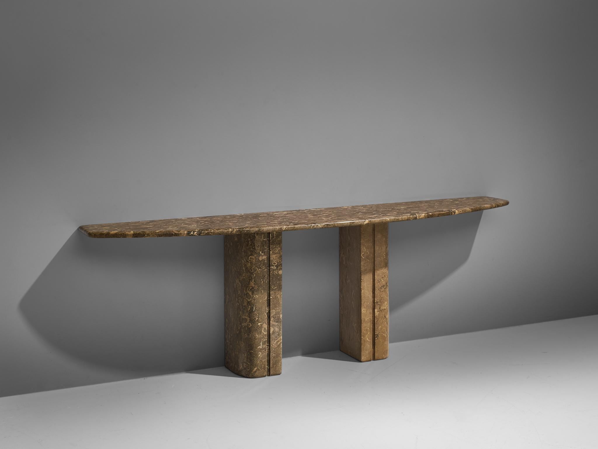 Console table, marble and metal, Italy, 1970s.

This console is a beautiful example of Italian design with an almost monumental appeal. The base of the table is formed out of two thick pillars. The rounded tabletop stretches out in a wonderful