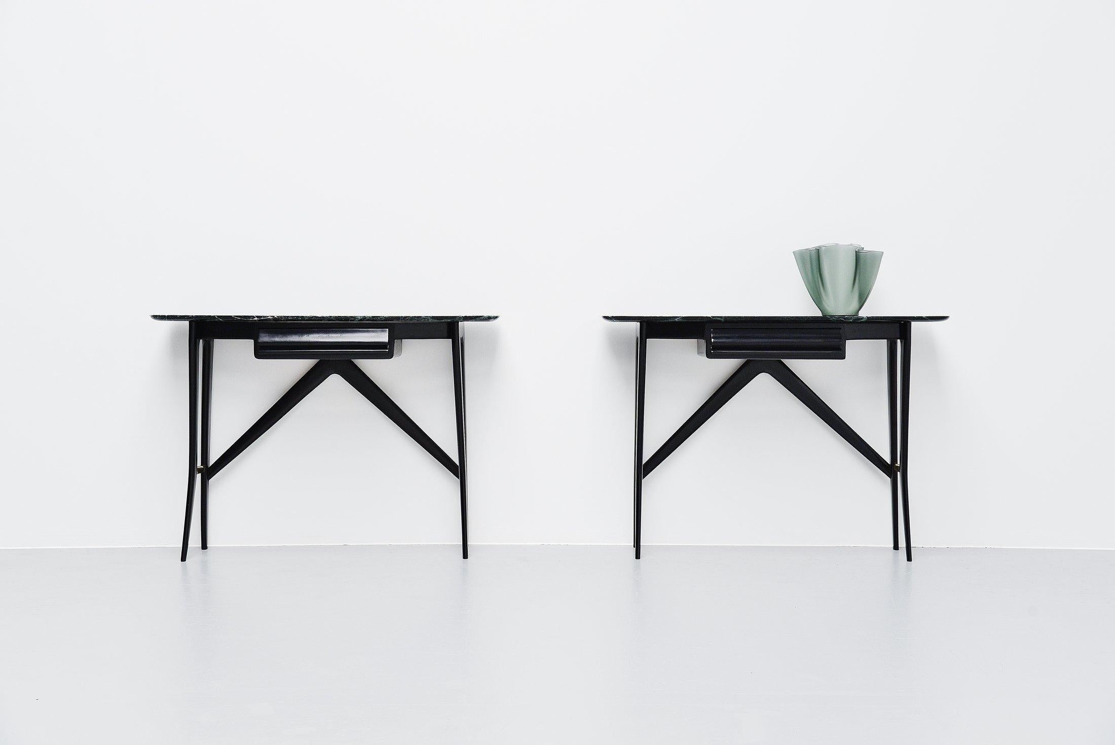 Fantastic shaped Italian pair of console tables made by unknown designer and manufacturer but in the style of Ico Parisi, Italy, 1950. This is for a gloss black ebonized beech wooden console pair with a dark green marble top. The green marble top