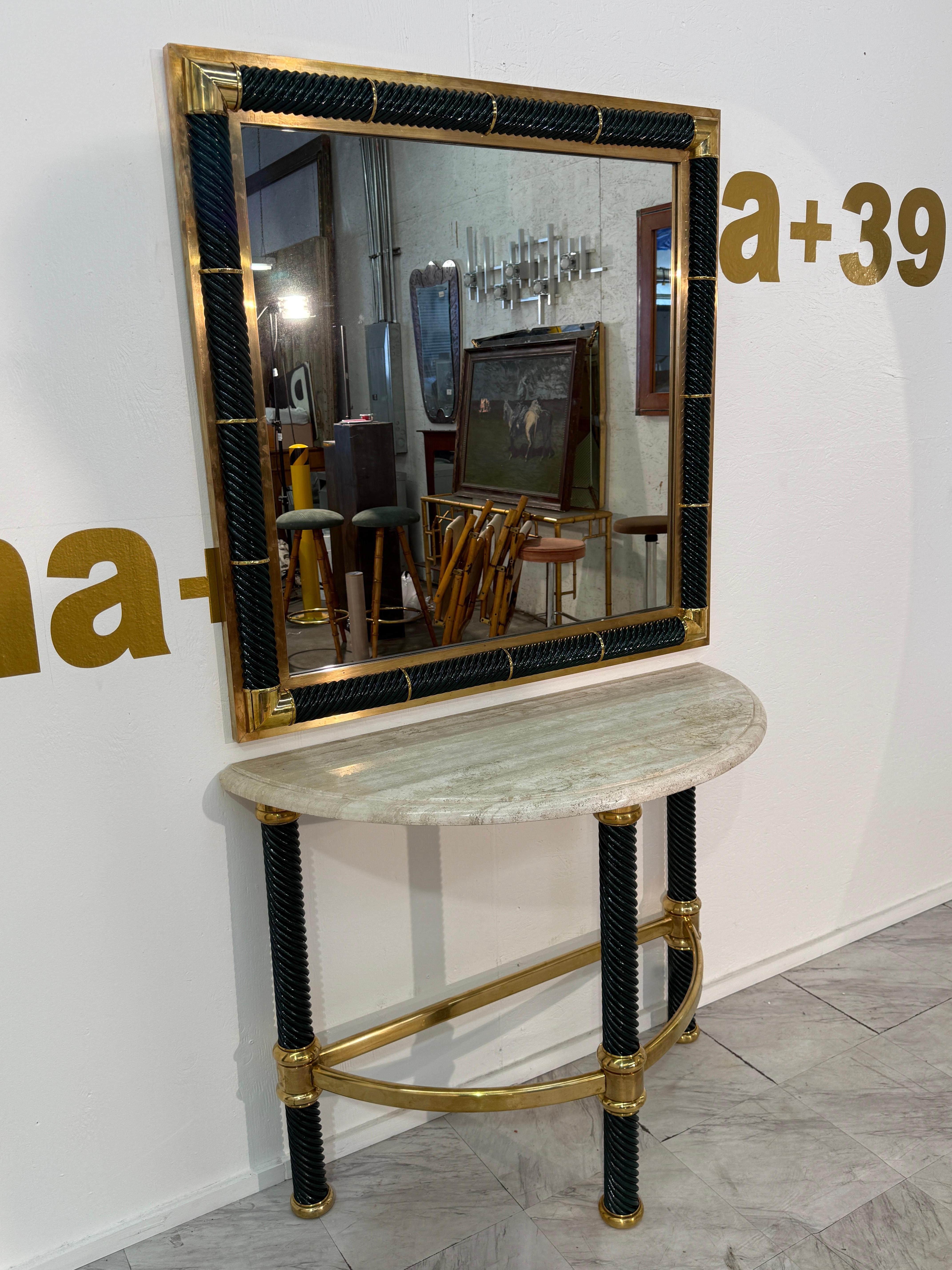 Italian Console with Mirror, Lacquered Dark Green
Sophisticated console and mirror set in the Italian neoclassical style.

Design: The console features a demi-lune travertine top supported by twisted dark green lacquered legs with gilt brass accents