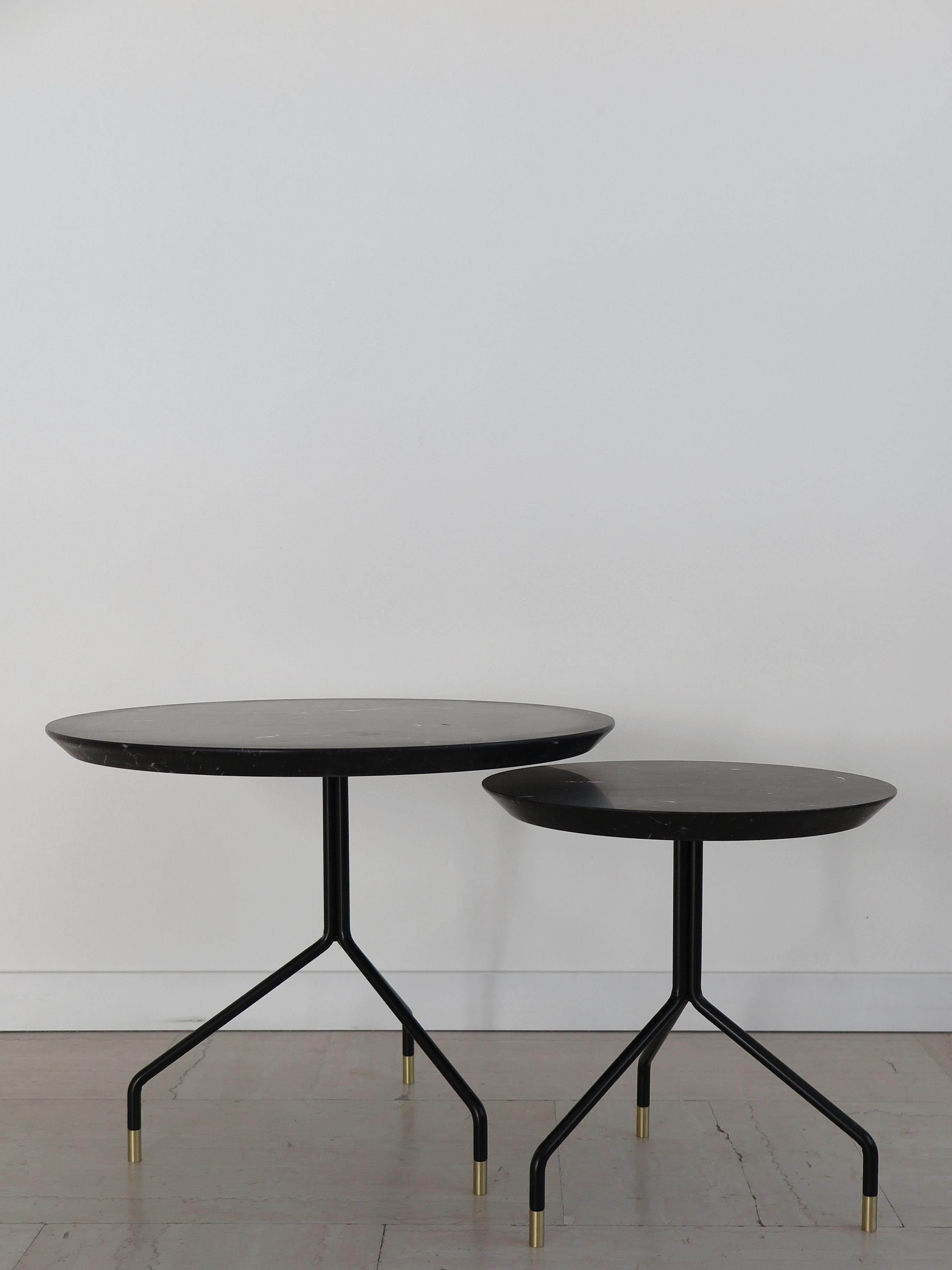Italian contemporary round coffee tables set of two, top with Black Marquinia Marble matt and black painted metal structure with brass terminals, new design Capperidicasa, limited edition.

Dimensions:
- Small size diameter 40 cm - height 43 cm
-