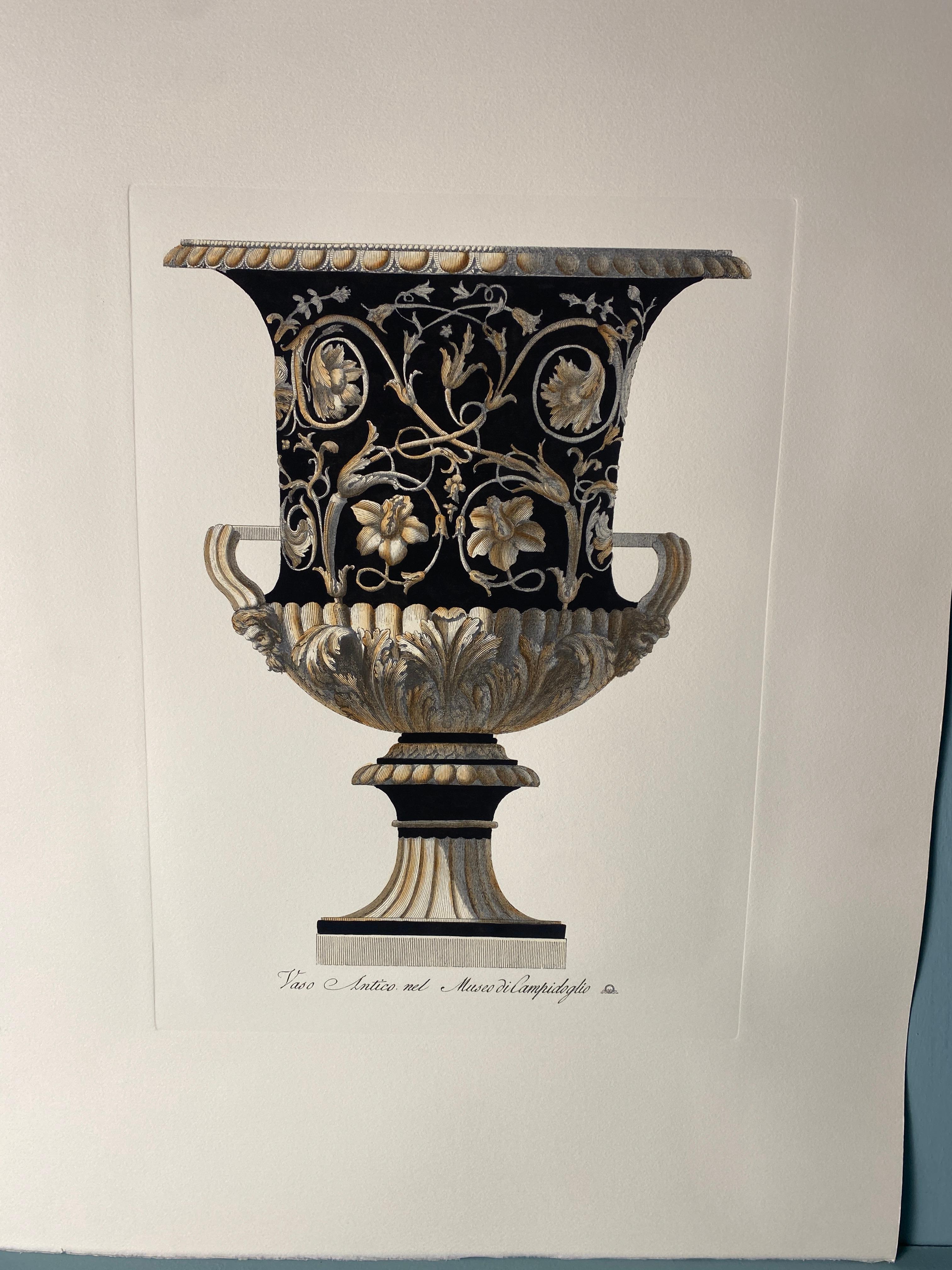 Beautiful print that is part of a series of four, representing an ancient Italian roman vase of Musei Capitolini in Rome. It is printed with an antique press and colored by our best local artistsans.
Completely handpainted with a cream wash, deep