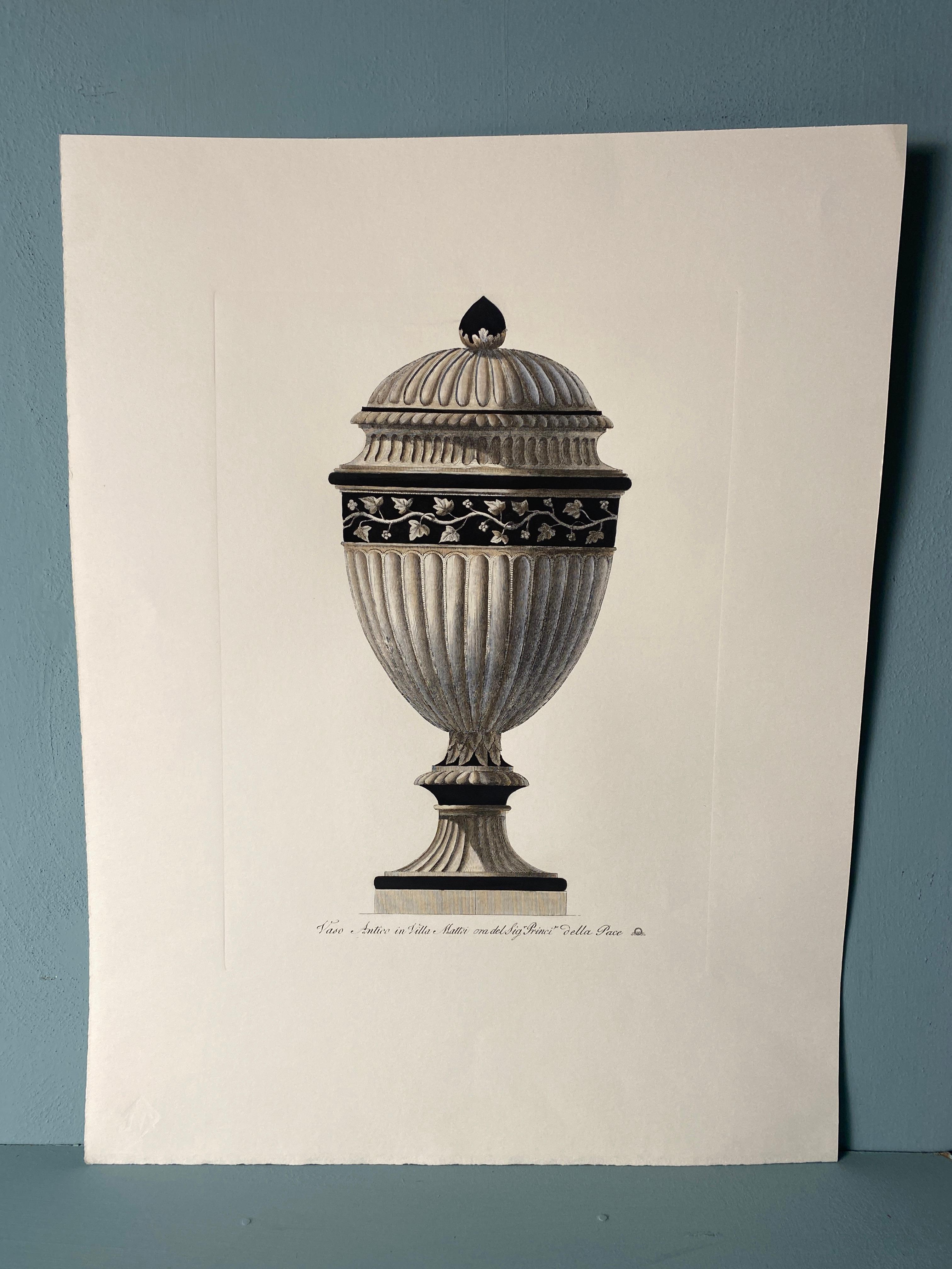 Beautiful print that is part of a series of four, representing an ancient Italian roman Vase-Urn of Villa Mattei in Rome. It is printed with an antique press and colored by our best local artistsans.
Completely handpainted with a cream wash, deep