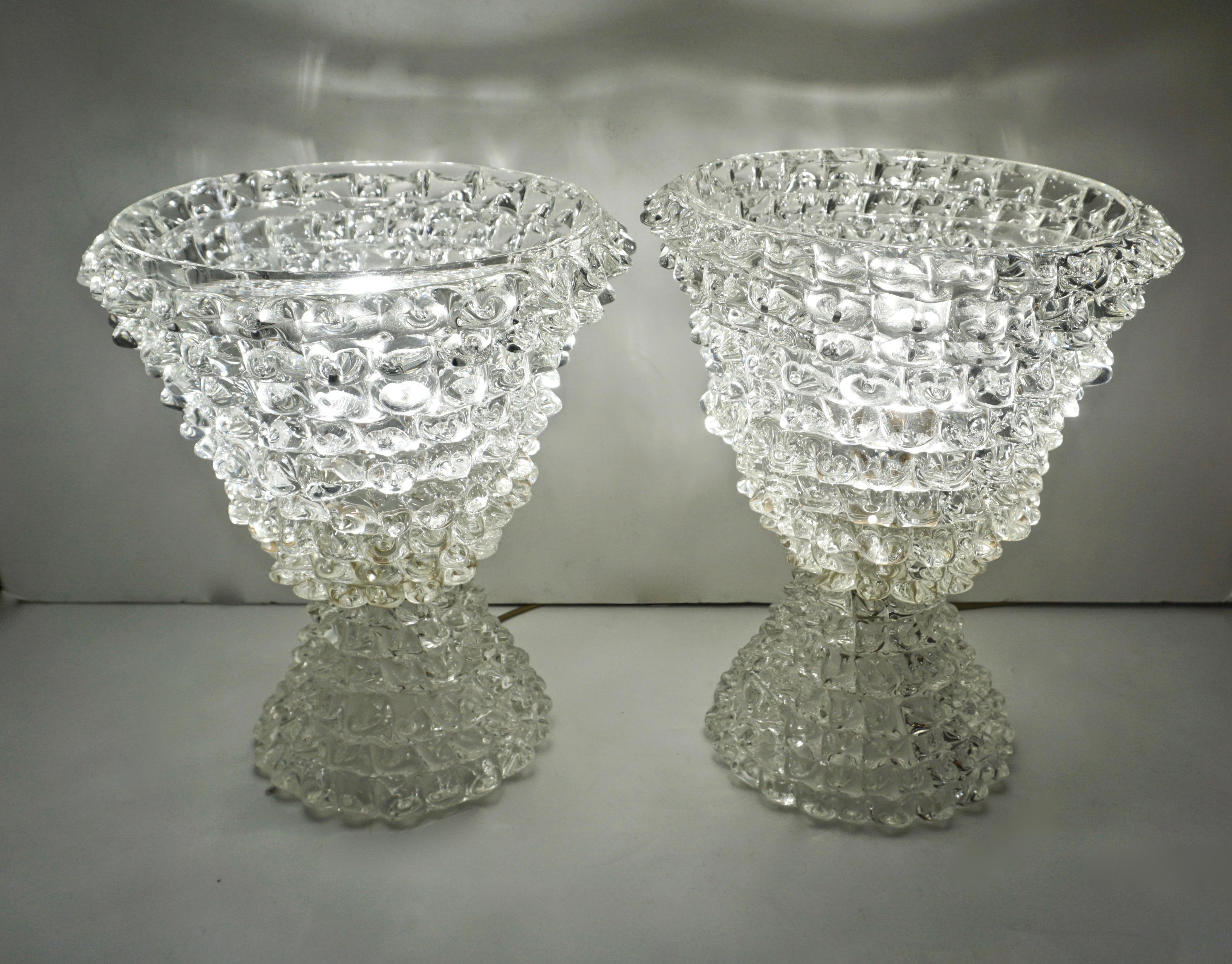 Exceptional pair of Murano glass lamps in the manner of Barovier, the blown crystal clear Murano glass worked with Rostrato, a difficult technique to master, that creates a 3-D spiked design playing with light and enhancing reflections, a decor