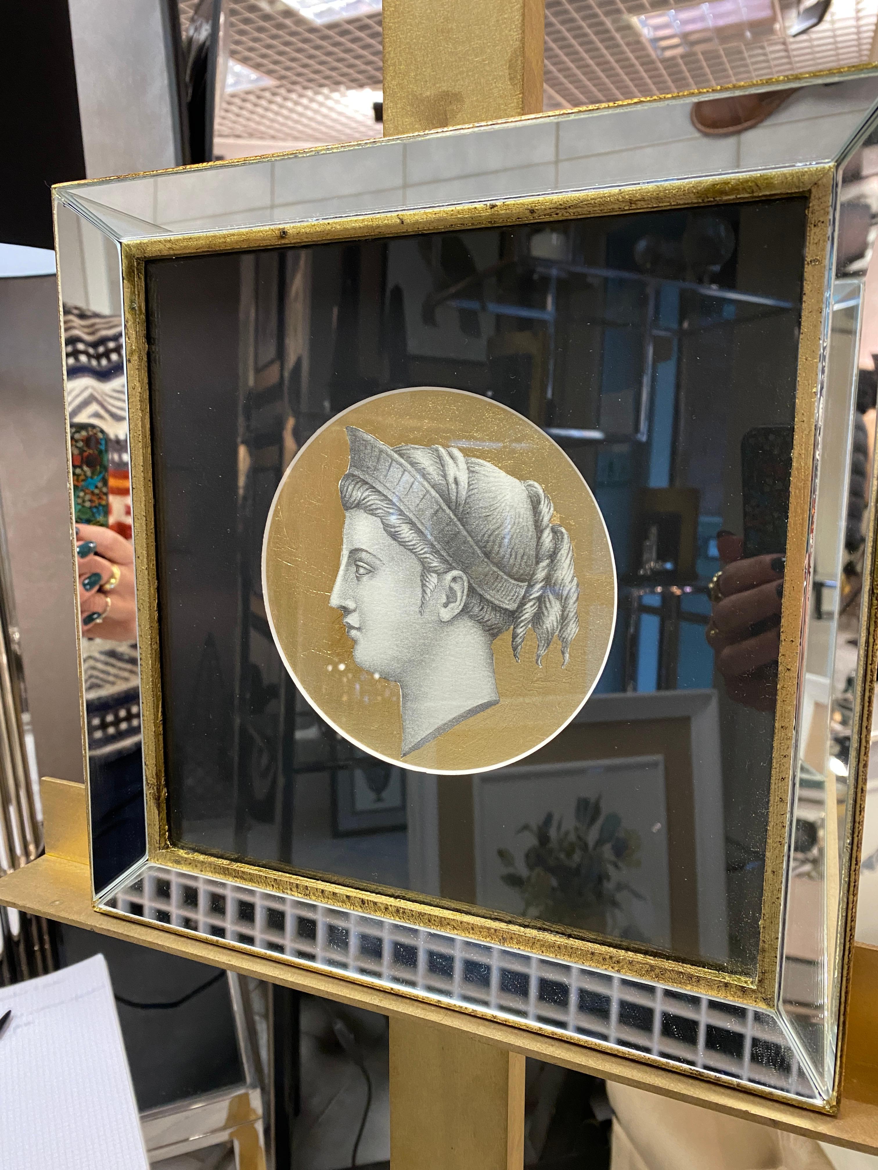 One of two etching printed ancient profile print with gold leaf background hand-gilded and enhanced with a square frame made of mirrors and gilded with gouache and burnished with a stone 
Each print is entirely printed in Italy by our