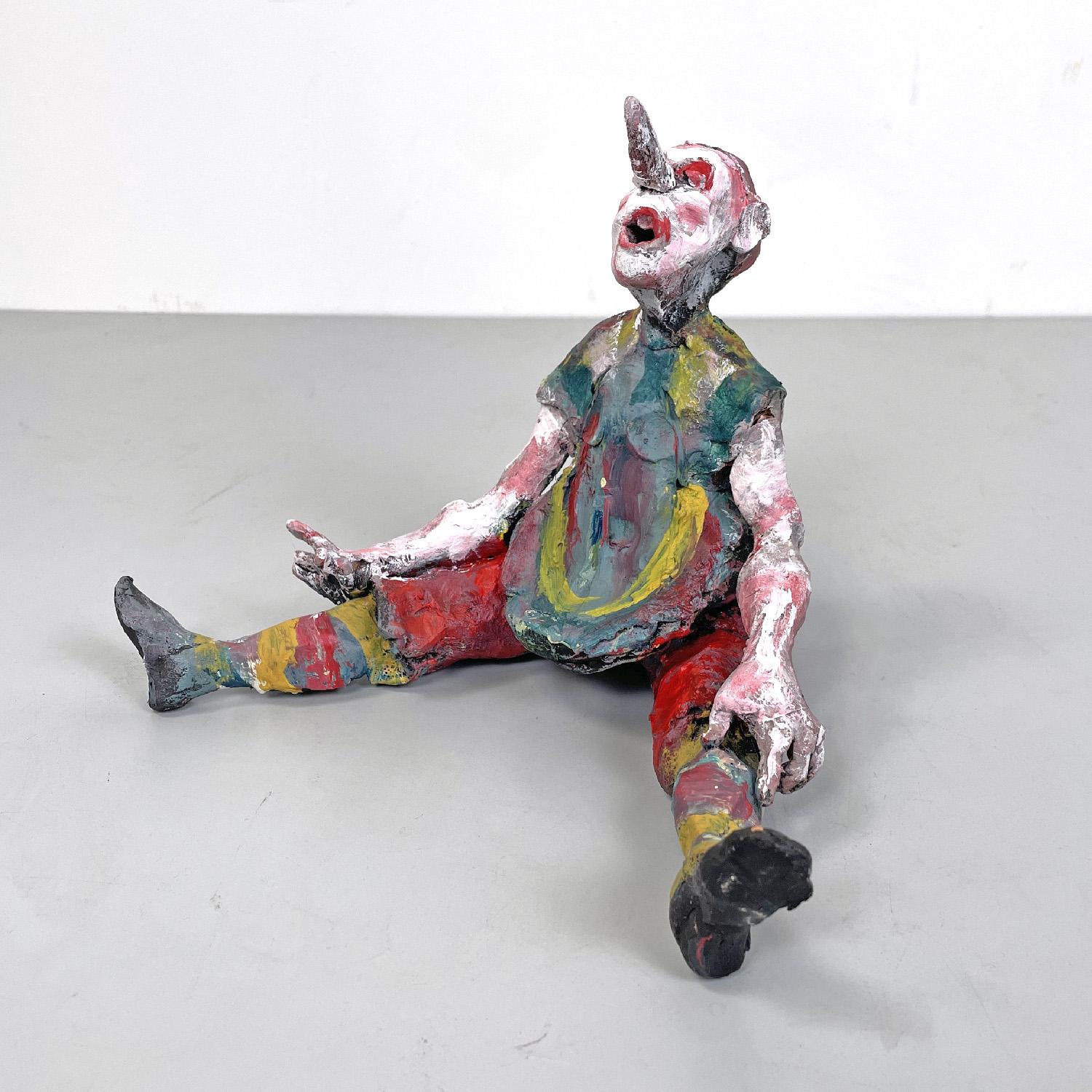 Italian contemporary terracotta sculpture of Pinocchio by Alfredo Milani, 2010s
Pinocchio sculpture in polychrome terracotta and acrylic. The material is worked in a rough and material way, as is the paint that decorates it in shades of white, red