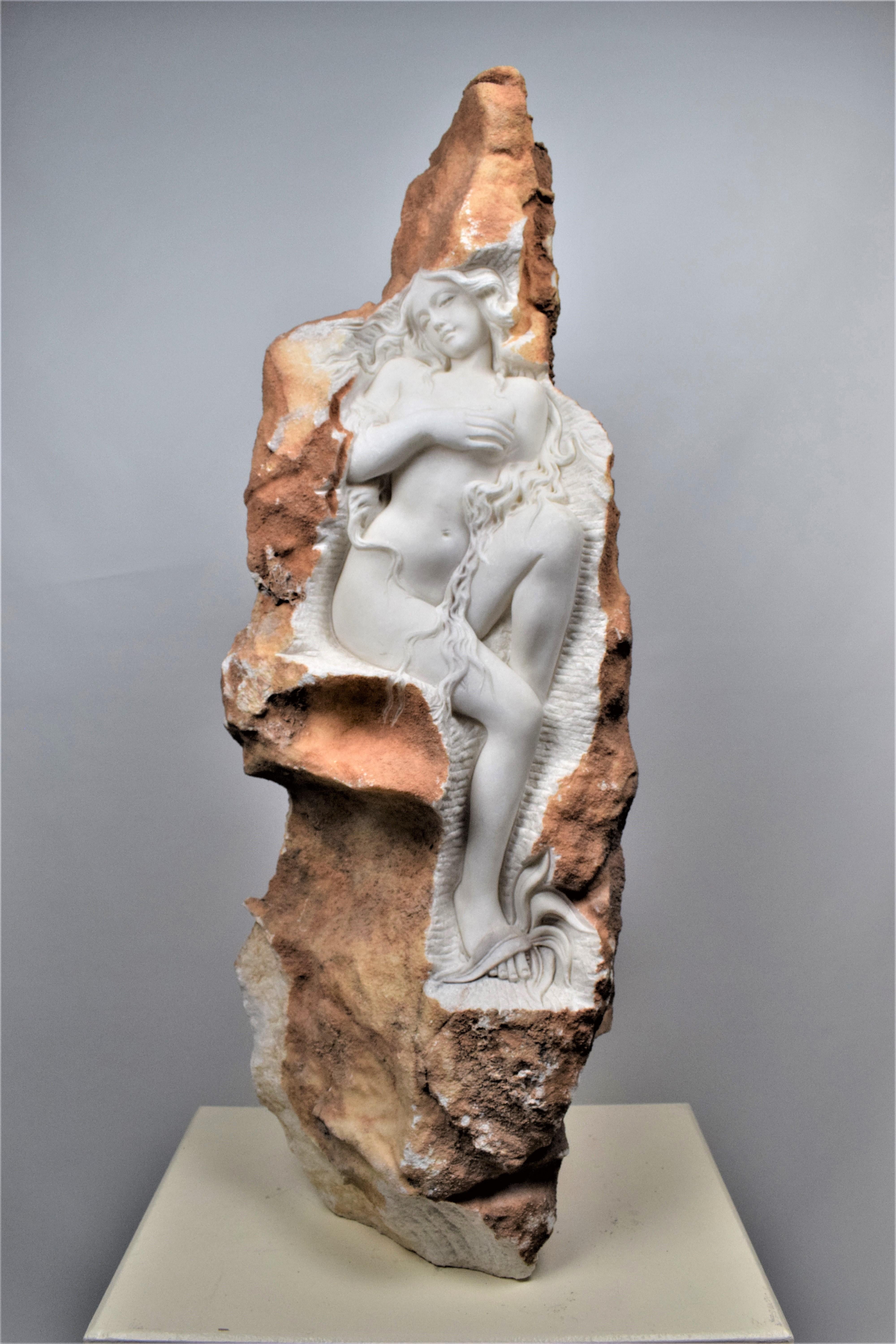 Italian contemporary Woman marble sculpture

A stunning and extremely high quality Italian white Carrara marble statue. The wonderfully executed statue depicts a beautiful young woman sculpted, emerging from within the piece of marble. The