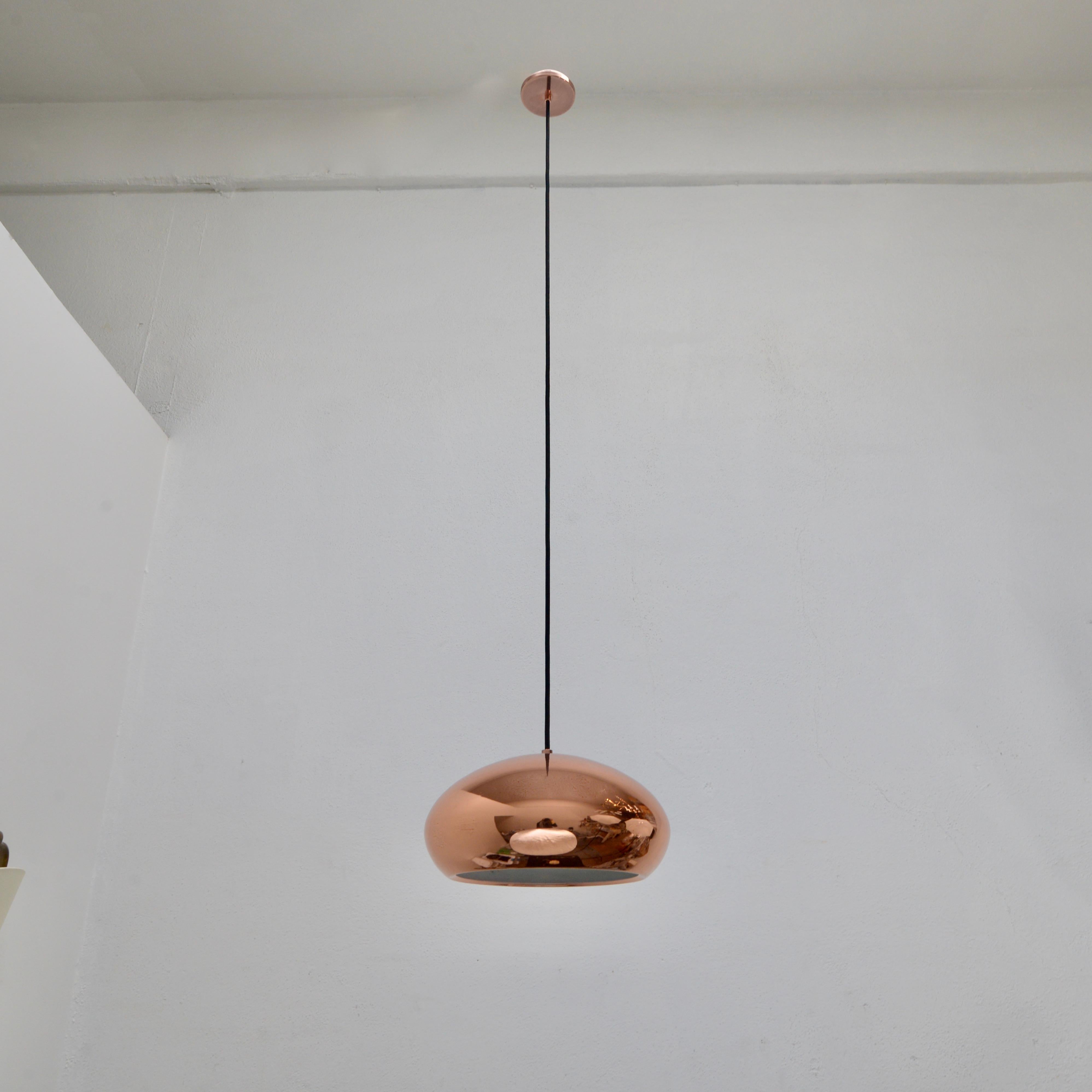 A beautiful 1960s original finish copper pendant from Italy, lightly patinated. With 1-E26 medium based socket, wired for use in the US. Light bulb included with order.
Measurements:
OAD: 56” can be adjusted
Diameter 12.5”
Fixture height 7”.
