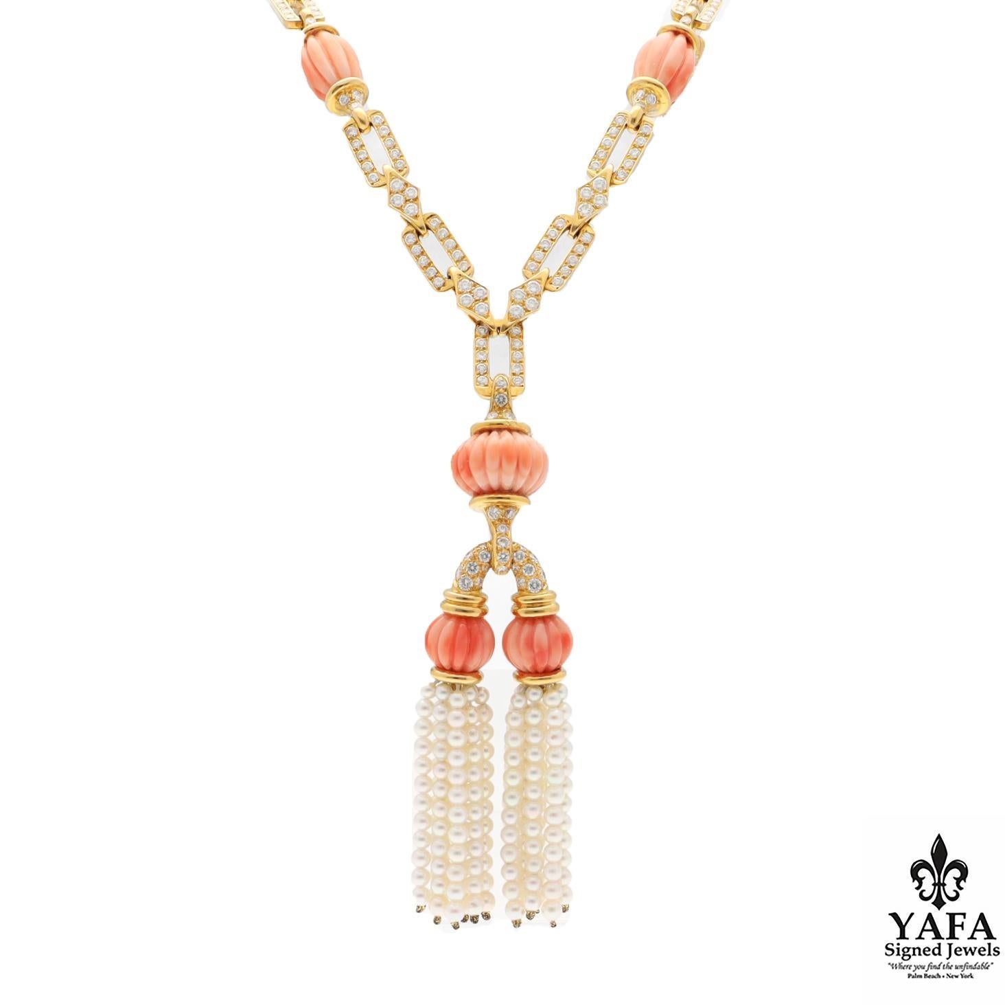 18K Yellow Gold, Italian Carved Coral, Diamond and Duet Petite Pearl Pompon Necklace. Inspired by the Flapper Necklaces of the 1920's this Creation Seamlessly Blends Historic Reference with Modern Day Allure.

Circa - 1990's
French Hallmark
