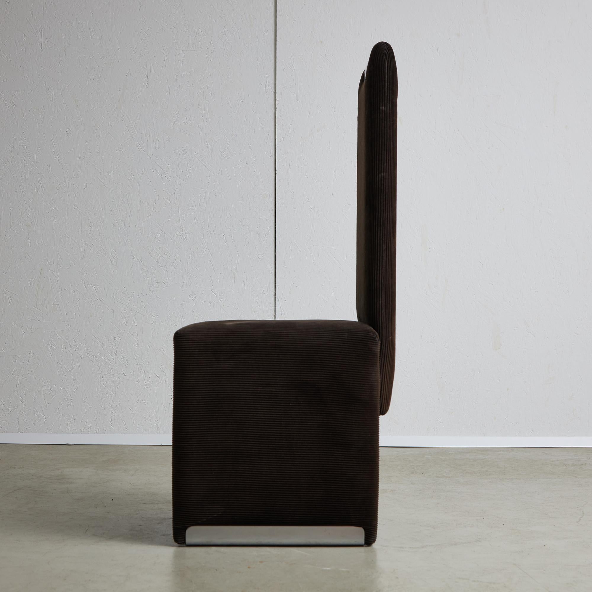 Presenting a distinguished collection of Italian chairs, dressed in a refined brown corduroy fabric that is synonymous with the timeless aesthetic of the 1970s. Designed by the famous Luigi Saccardo, these chairs feature chrome detailing that