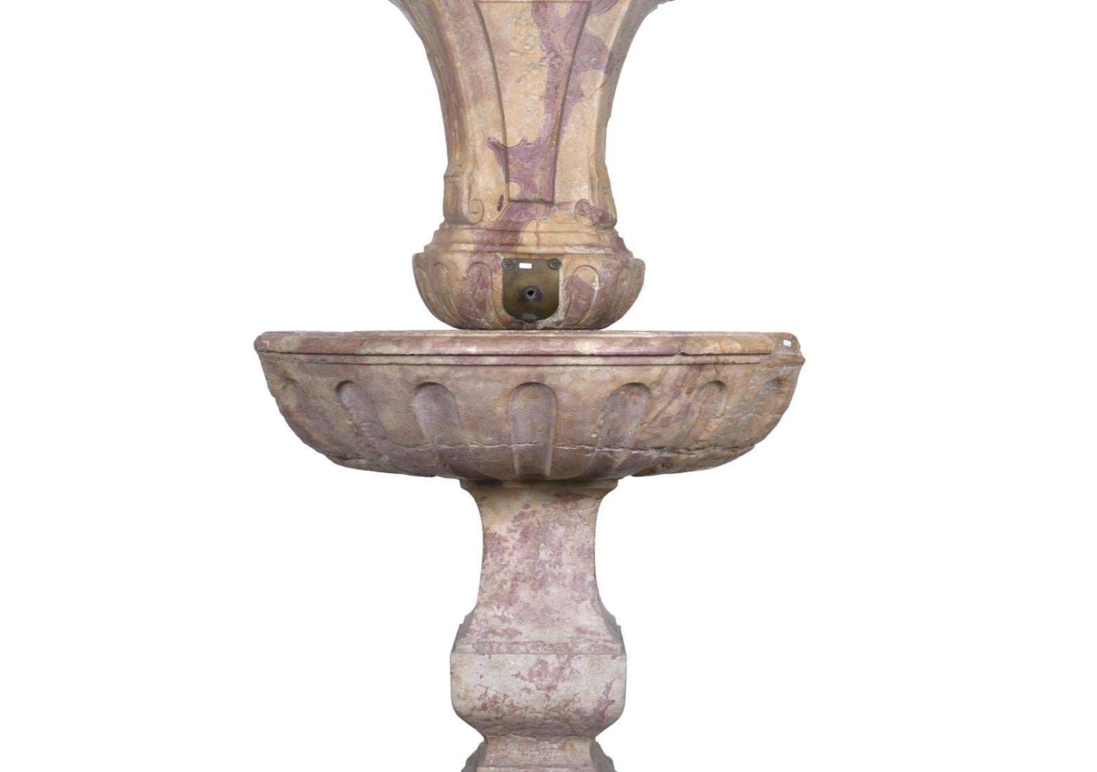 Italian Corner Fountain
18th century
In burgundy stone.
Divided into three parts.
Measures: 172 x 89 x 72 cms. total
Very good condition.