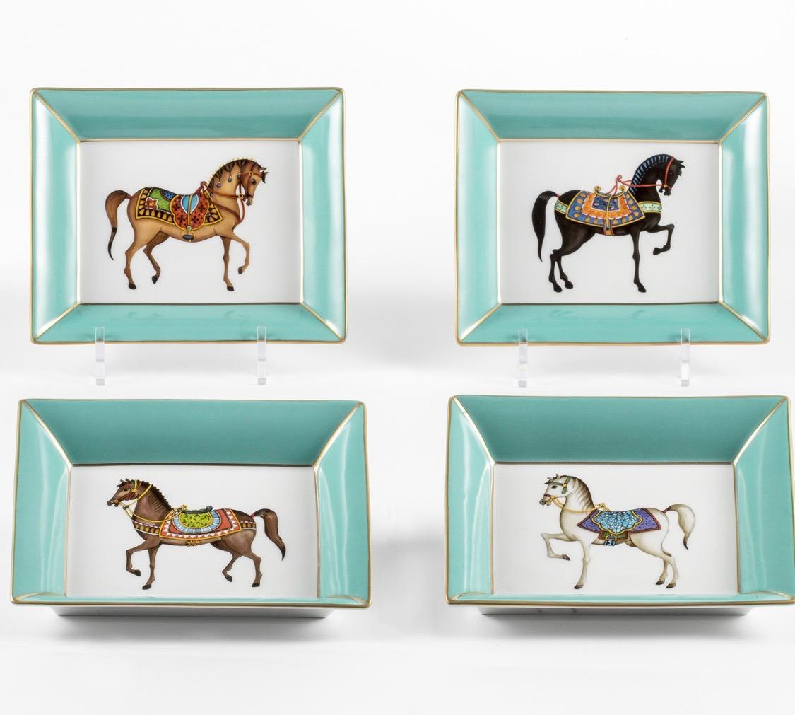 Italian craftsmanship Pocket tray decorated with 4 different horses gold and teal border. 
Entirely made in Florence by our master craftsmen.

Artecornici design produces hand colored art prints, artisan frames, lightings, decorative accessories and