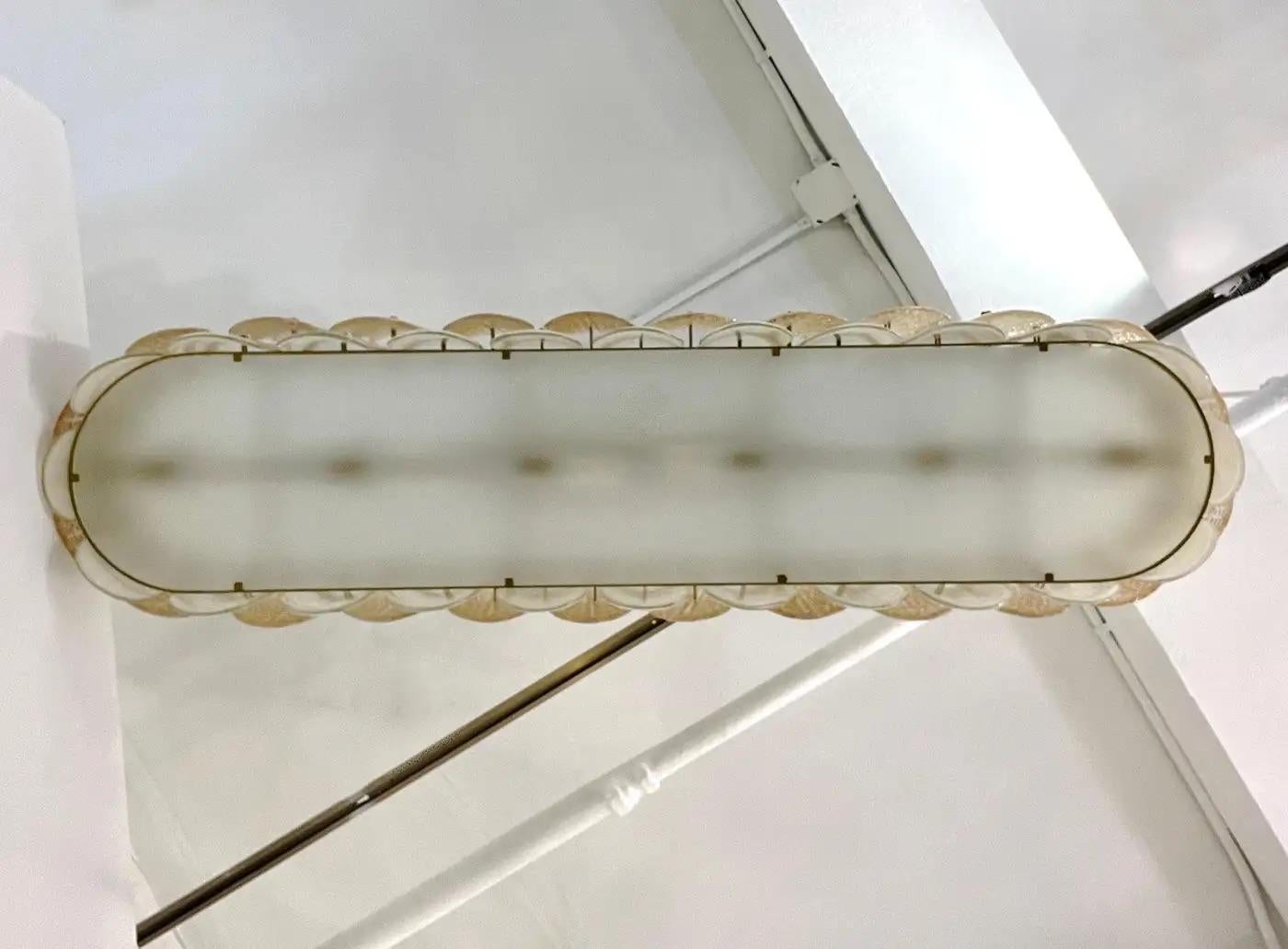 Contemporary Italian Cream Ivory Crystal Gold Texture Murano Glass Oval Brass Chandelier For Sale