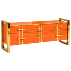 Italian Sideboard with Orange Glass, Three Drawers, and Brass Frames