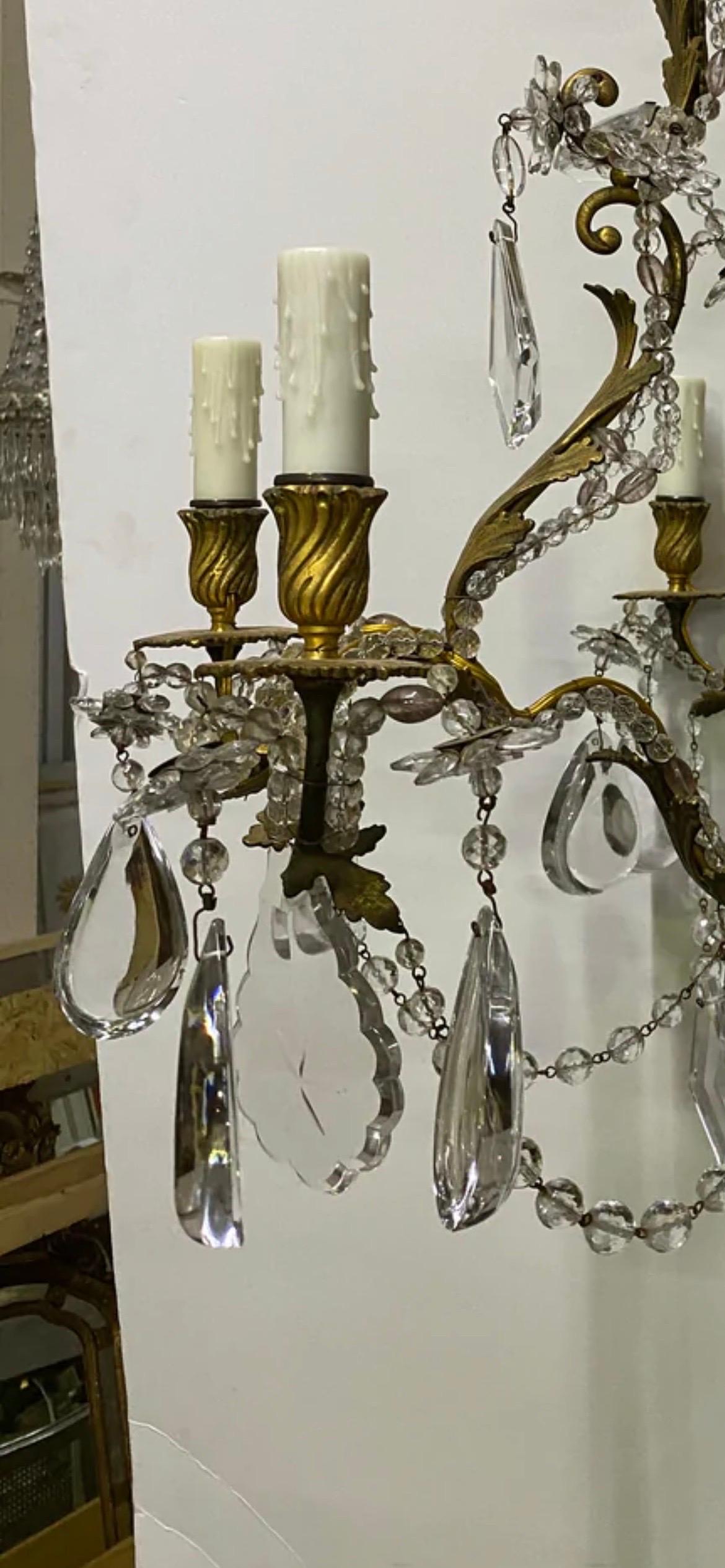 A stunning 6 arm Italian Crystal solid brass chandelier that is wired, cleaned and ready to go for it's new home. This piece exudes luxury and refinement. We feel that this a complete staple piece and is beautiful for any space whether it be a