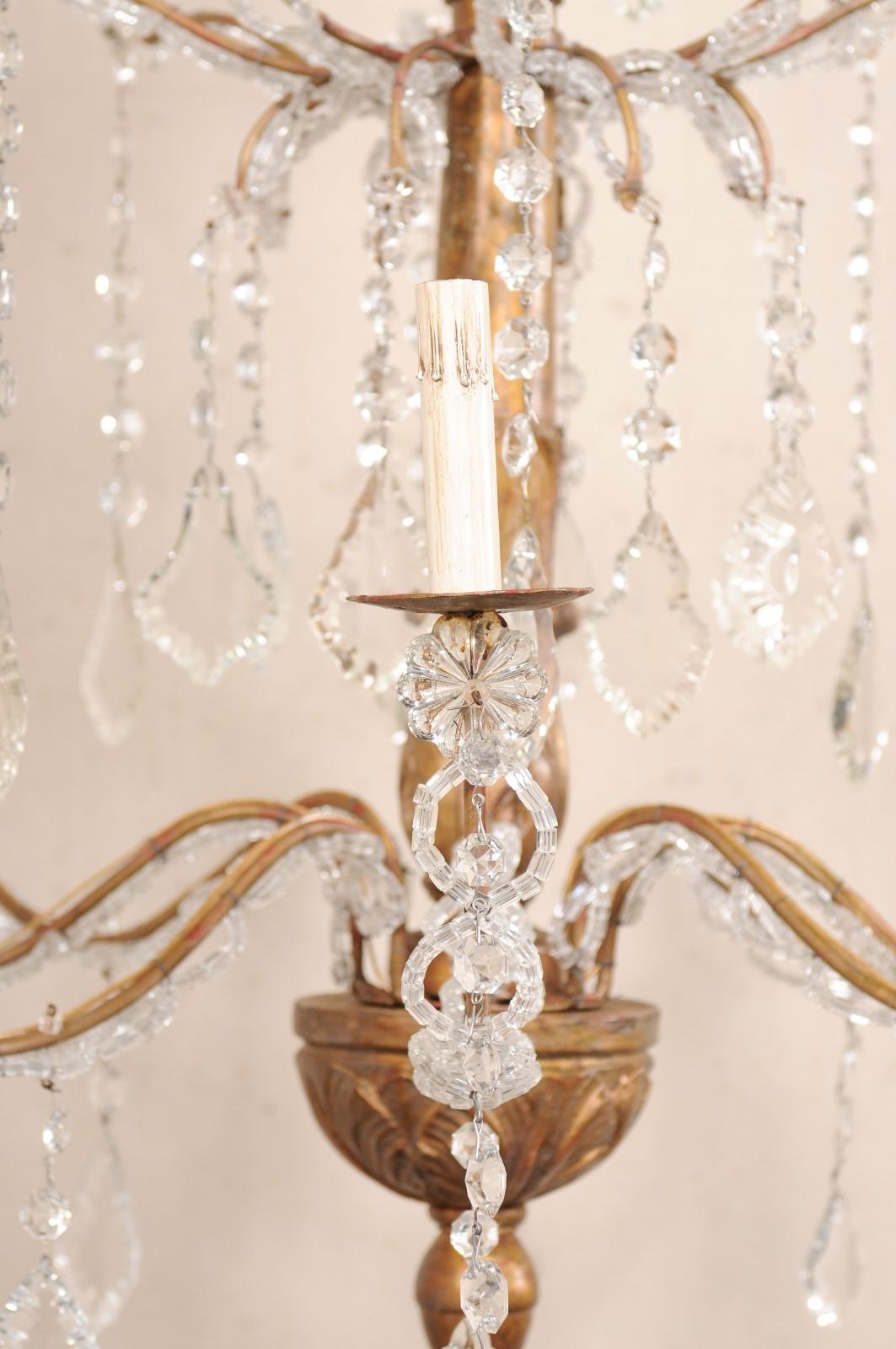 Lampadario italiano a 8 luci in cristallo con colonna centrale in legno intagliato, metà del XX secolo. in vendita 3