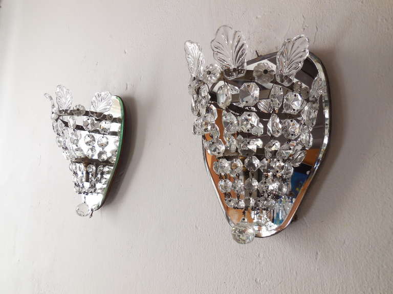 Housing one light each. Will be rewired with certified US UL sockets for the USA.  Vintage crystal prisms and big Murano glass leaves on top. Mirrors have some silver missing. Re-wired and ready to hang! Free priority UPS shipping from Italy, no