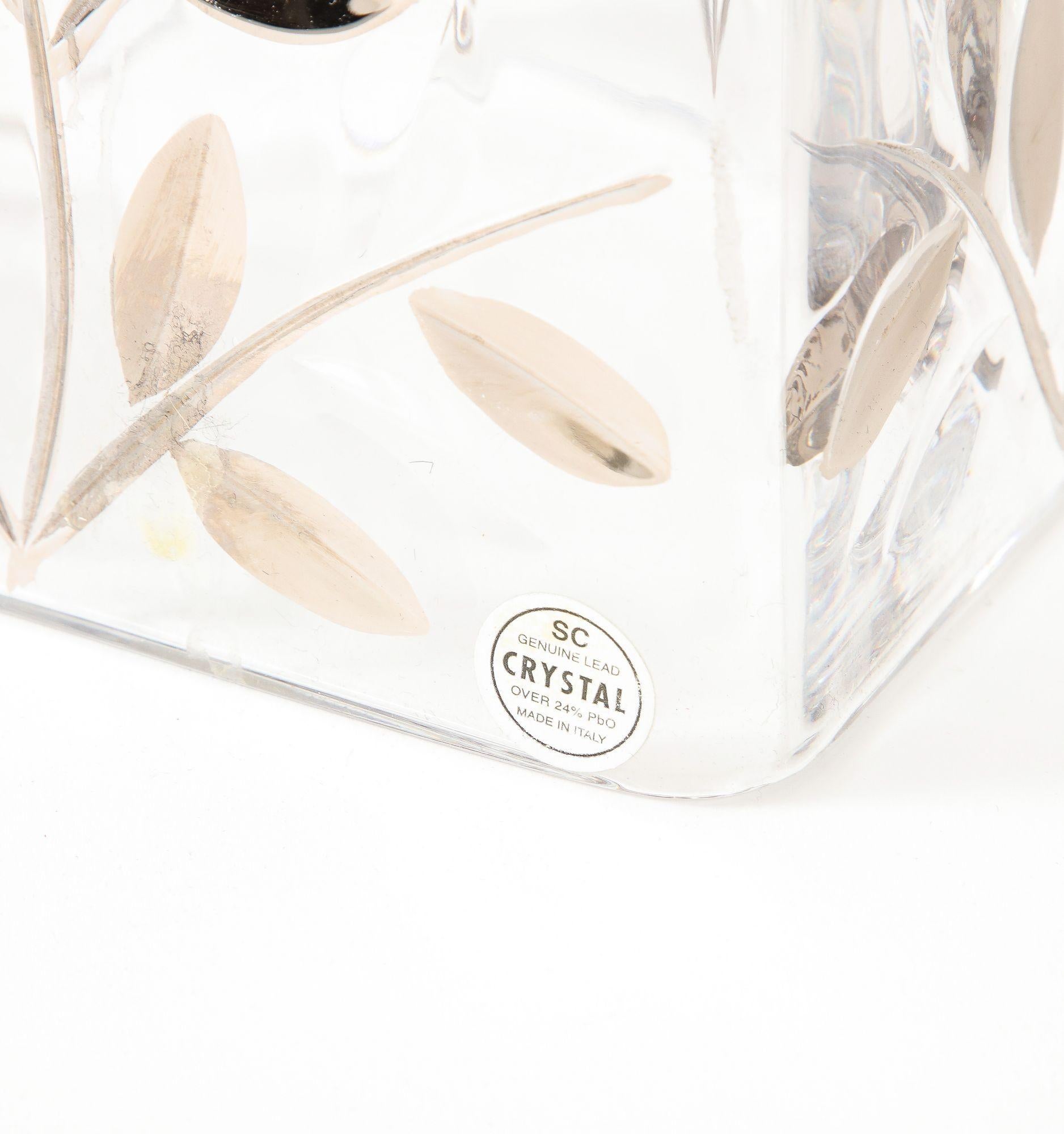 A great Italian crystal waste basket and tissue cover with silver leaf and beveled crystal decoration.