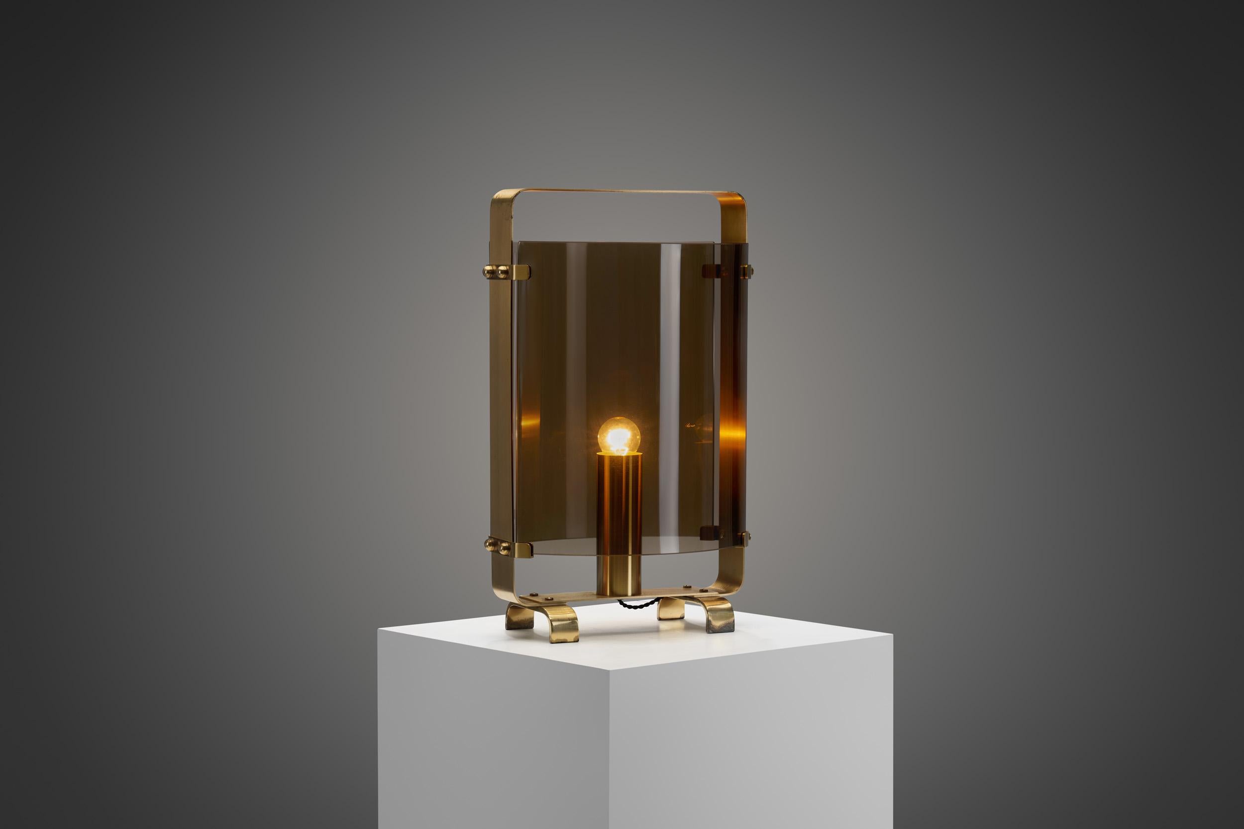 This one-of-a-kind table lamp is a delightfully distinctive model, with an immediately recognizable look. The mid-century period was fueled by the development of new materials and technology with stunning results, as seen in this lamp’s design. This