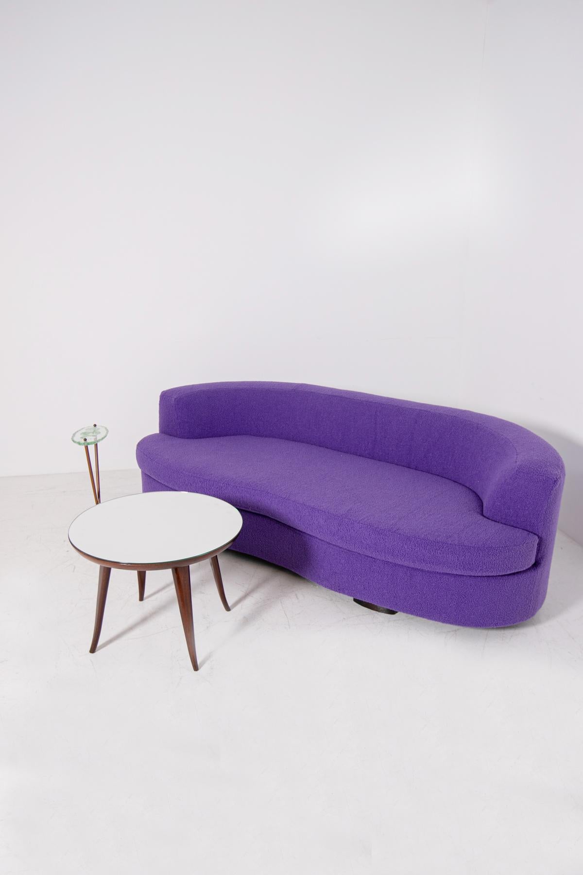 purple curved sofa